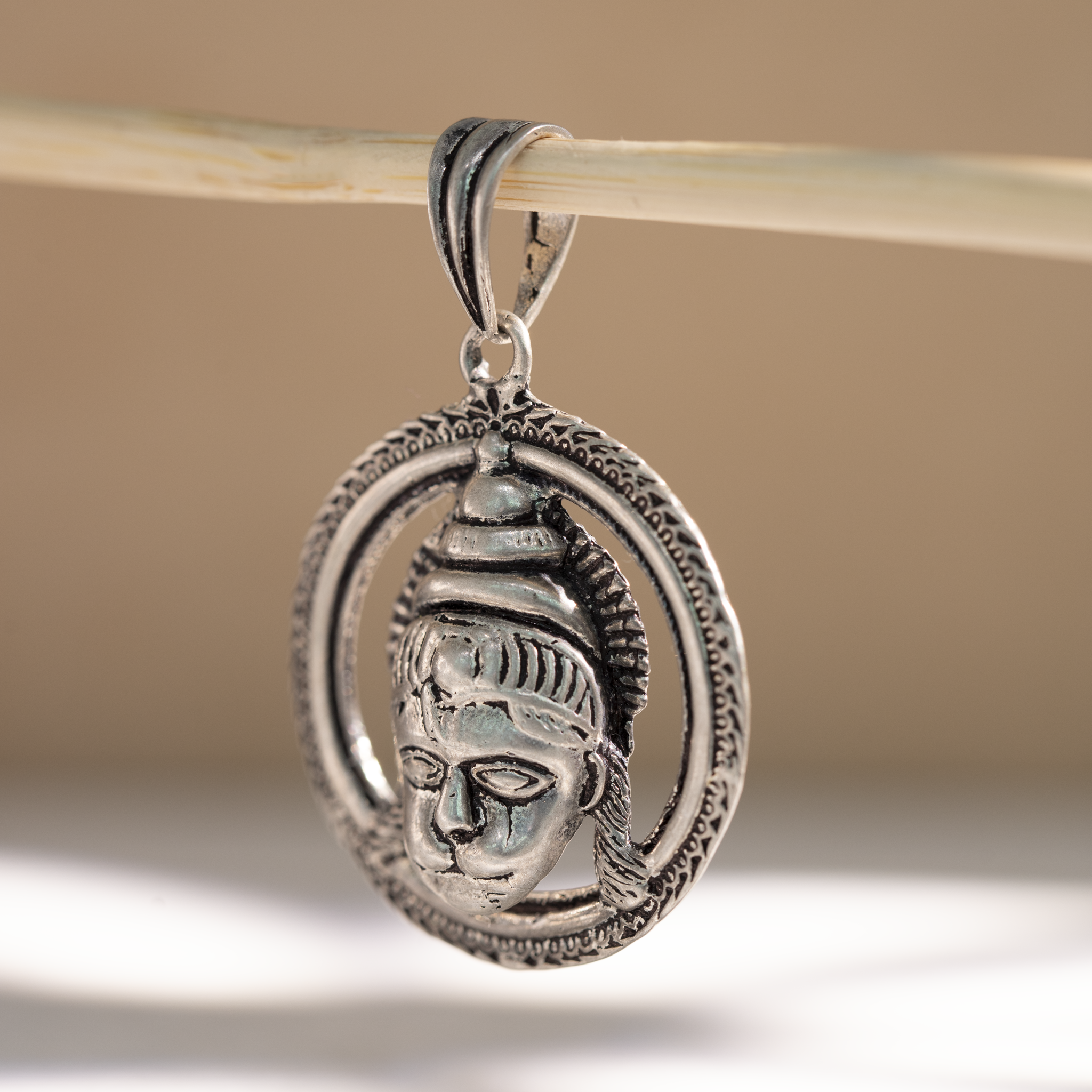 Hanuman silver pendant close up