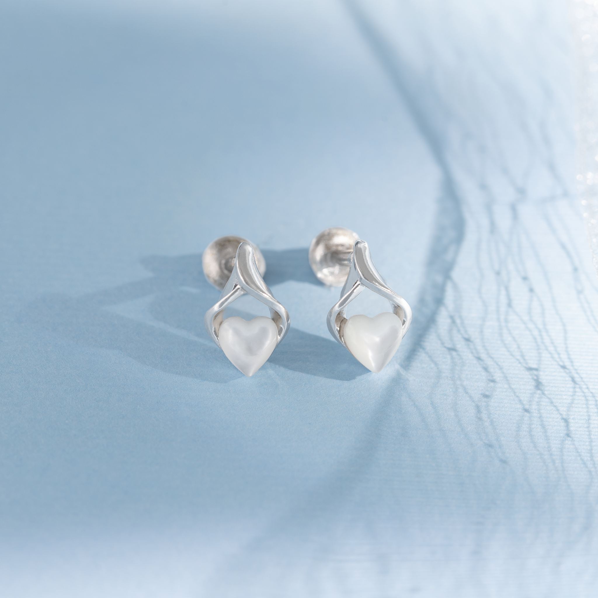 Heart drop silver stud earrings