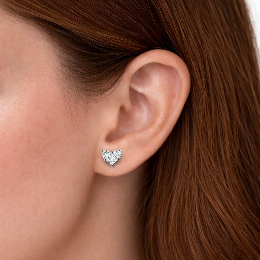 Heart motif stud earrings