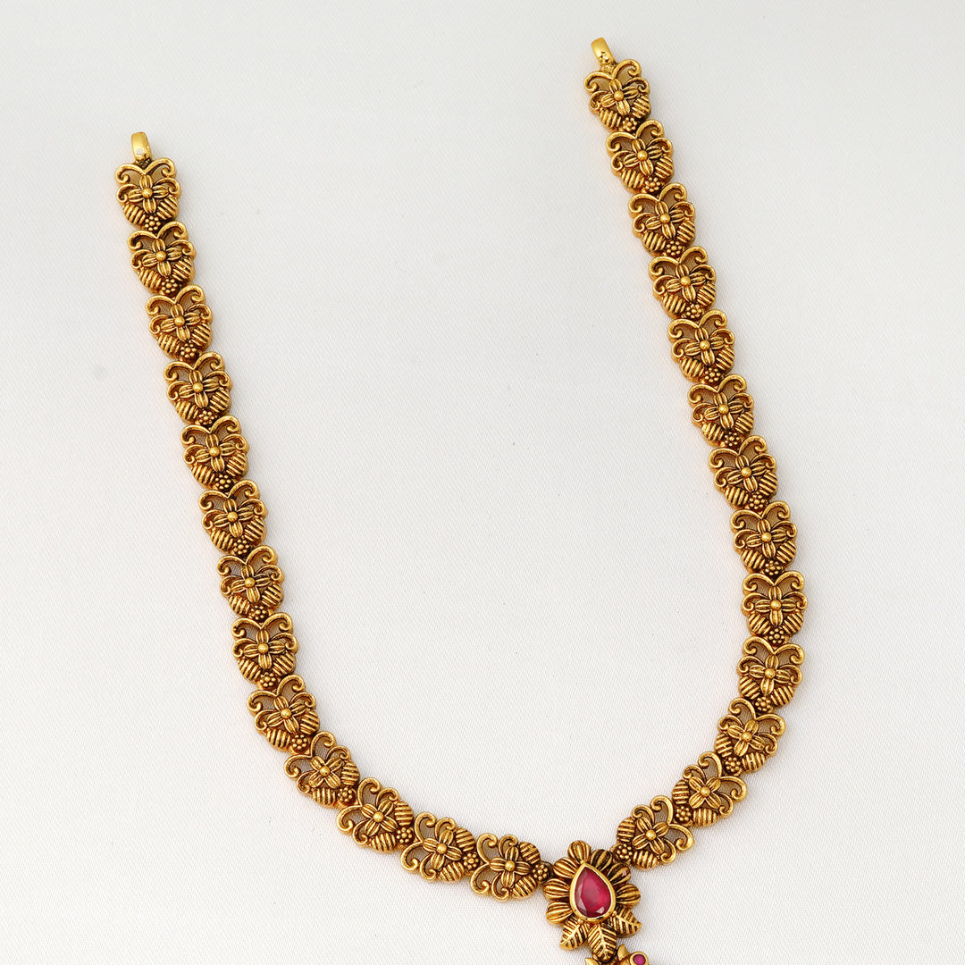 Heritage bridal necklace with peacock pattern and dangling pearl