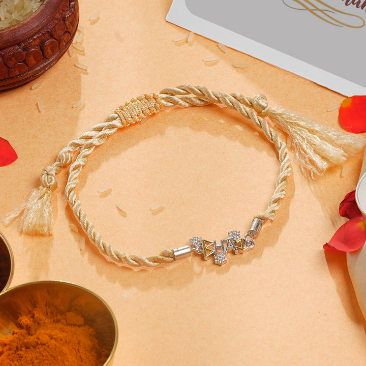 ISHNA 925 Silver Bhai Rakhi with Cream Golden Thread