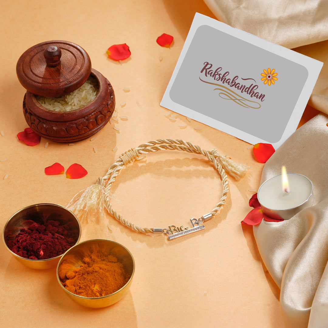 ISHNA 925 Silver Big B Rakhi with Cream Golden Thread