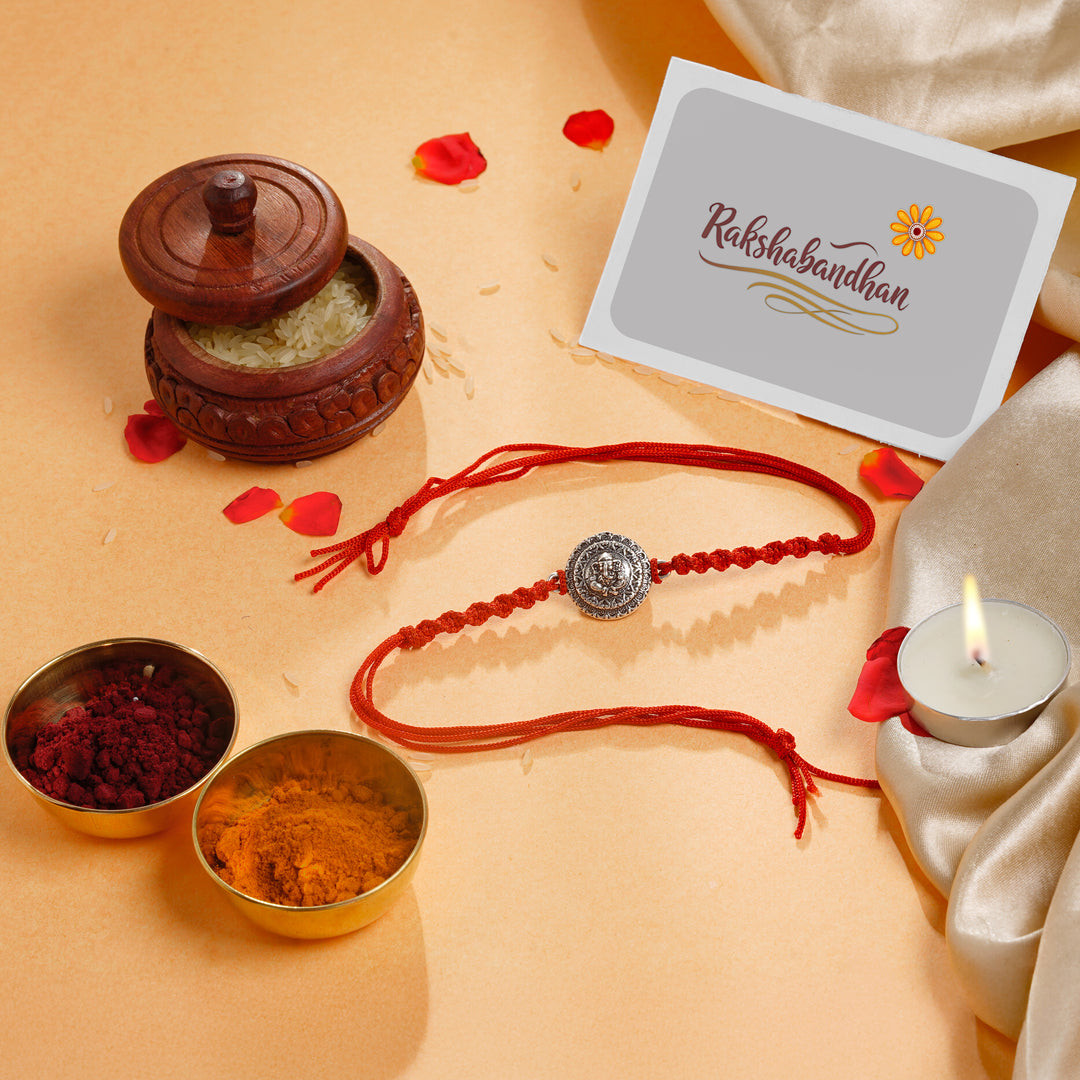 ISHNA 925 Silver Ganesh Rakhi with Red Thread