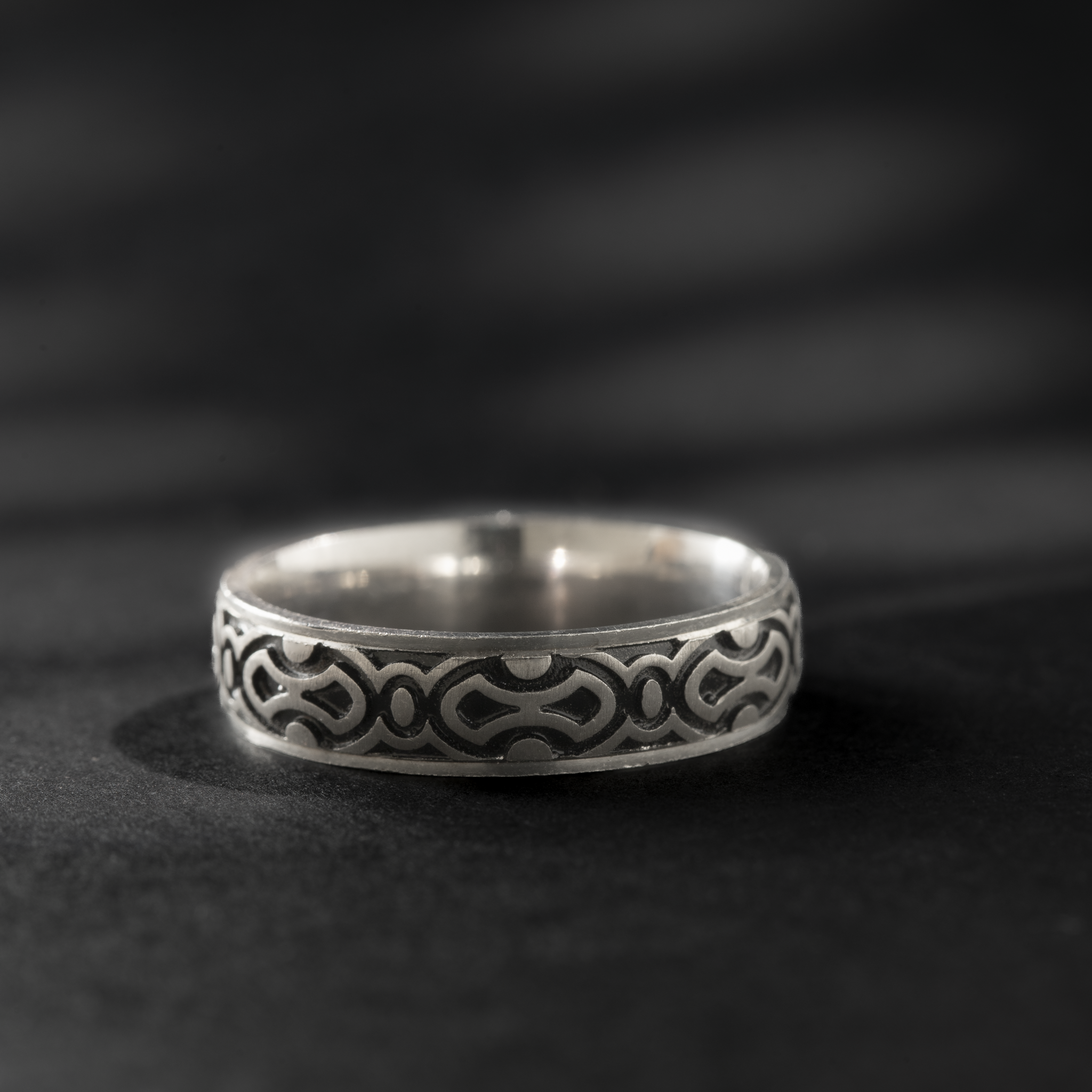 Intricate design silver ring