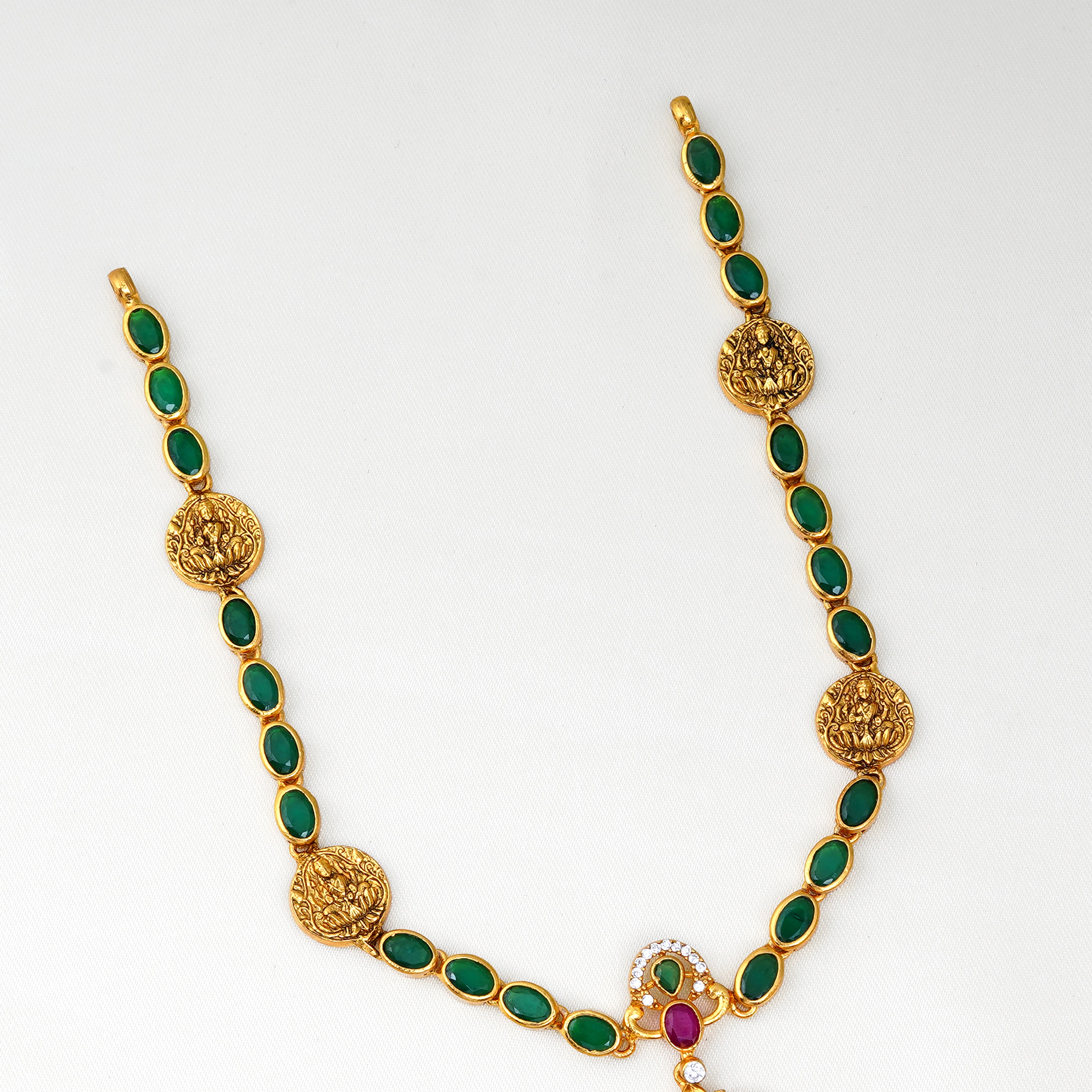 Ishna gold-plated Lakshmi necklace with ruby and emerald stone