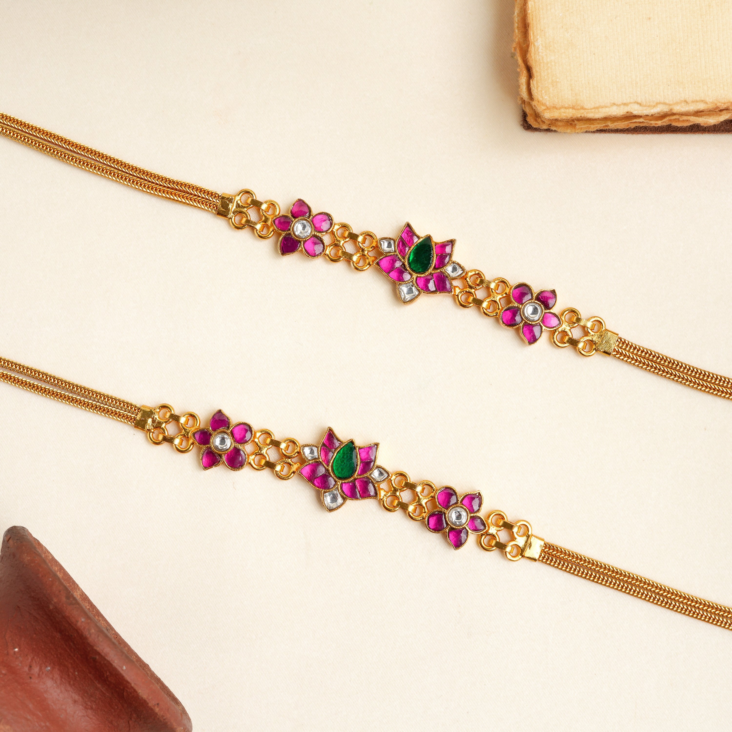 Kundan anklet with ruby and green stones