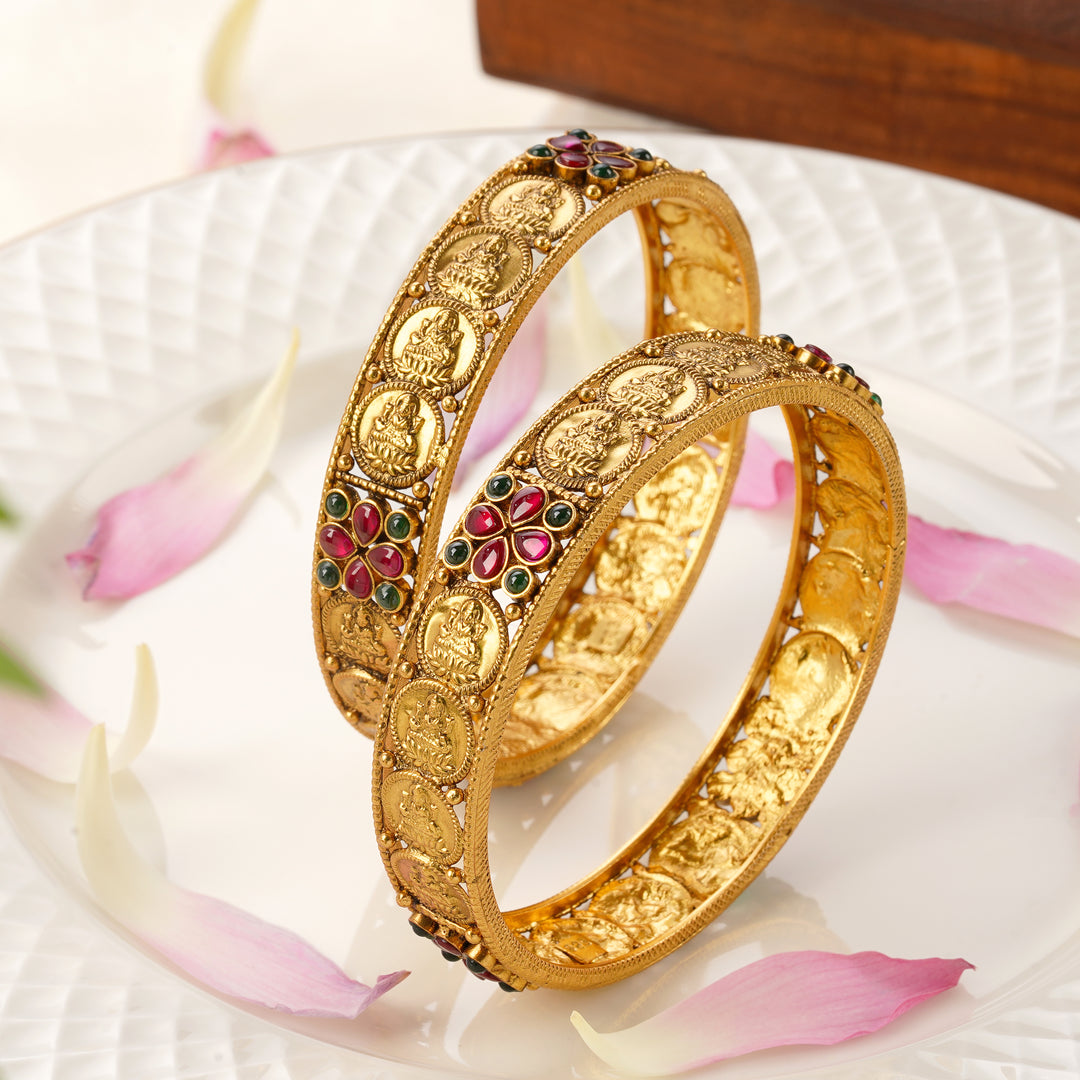 Lakshmi Nagas gold plated bangles with ruby emerald design