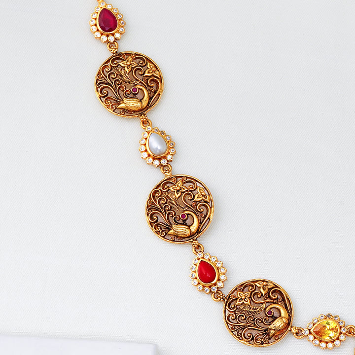 Lakshmi motif temple necklace with Navaratna stones and antique Annam coins