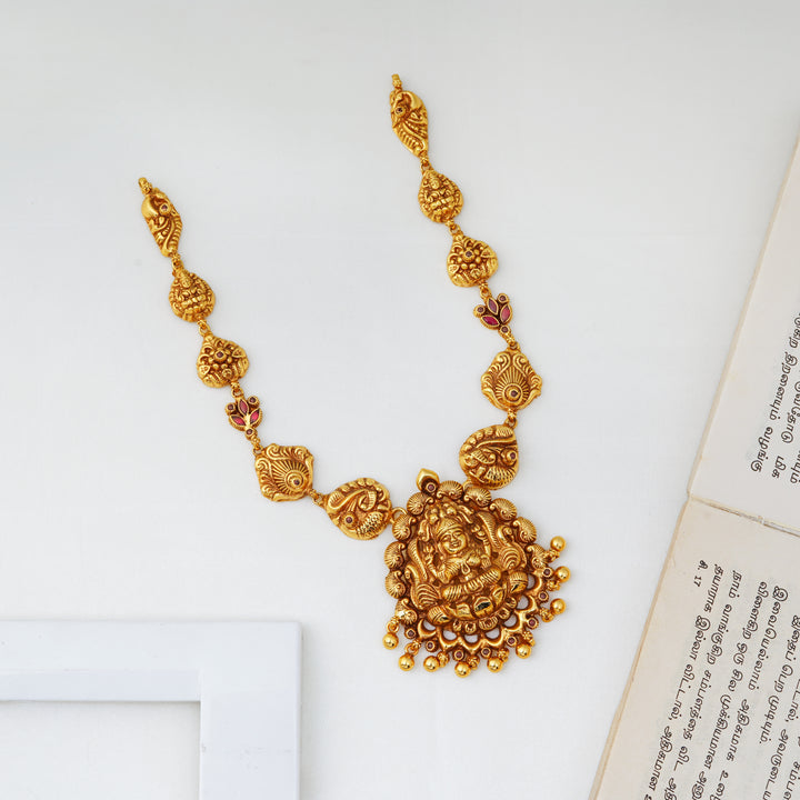 Lakshmi temple necklace with peacock motif in antique gold finish