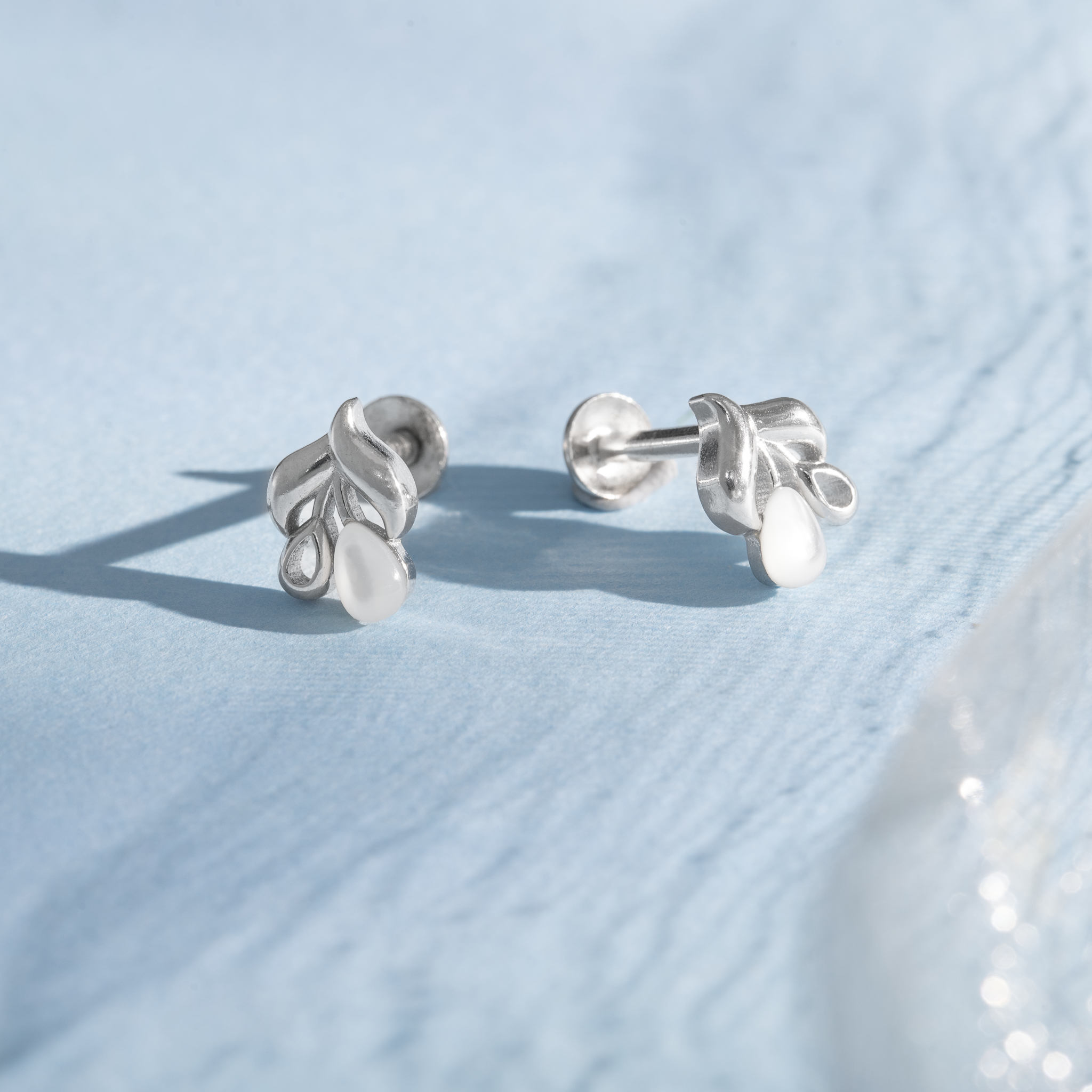 Leaf drop silver stud earrings