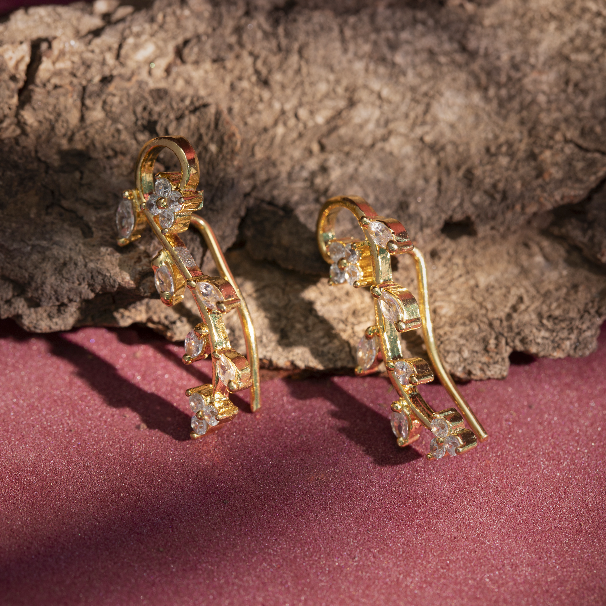 Leaf motif gold ear cuff with stones