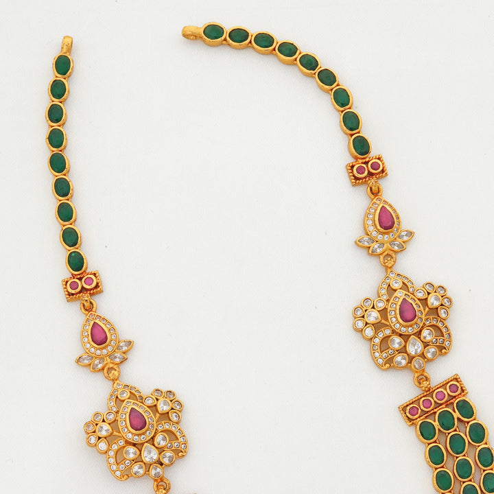 Long emerald stone malai necklace with ruby and CZ floral detailing in 24K gold plating