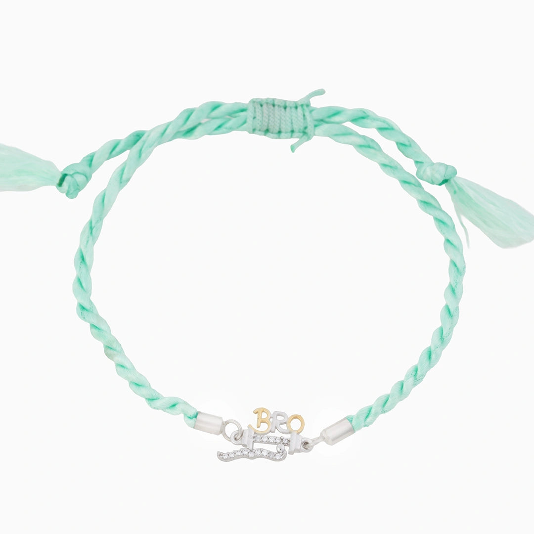 Mint green thread rakhi for bro Ishna