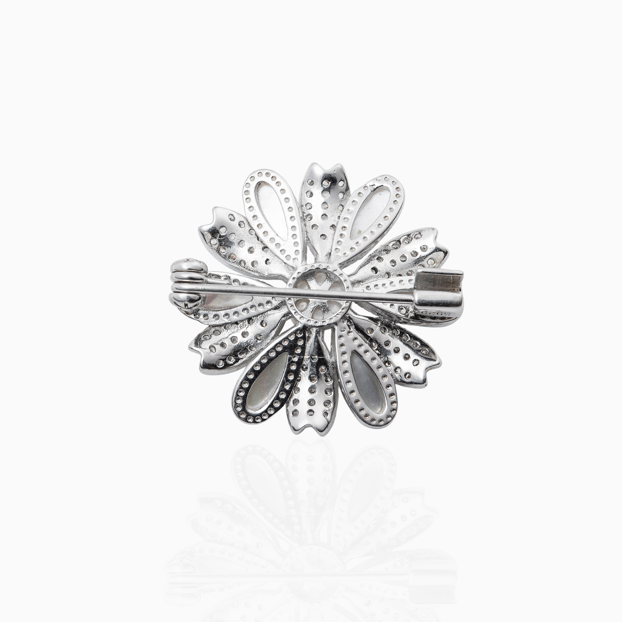 Mother of pearl floral silver brooch