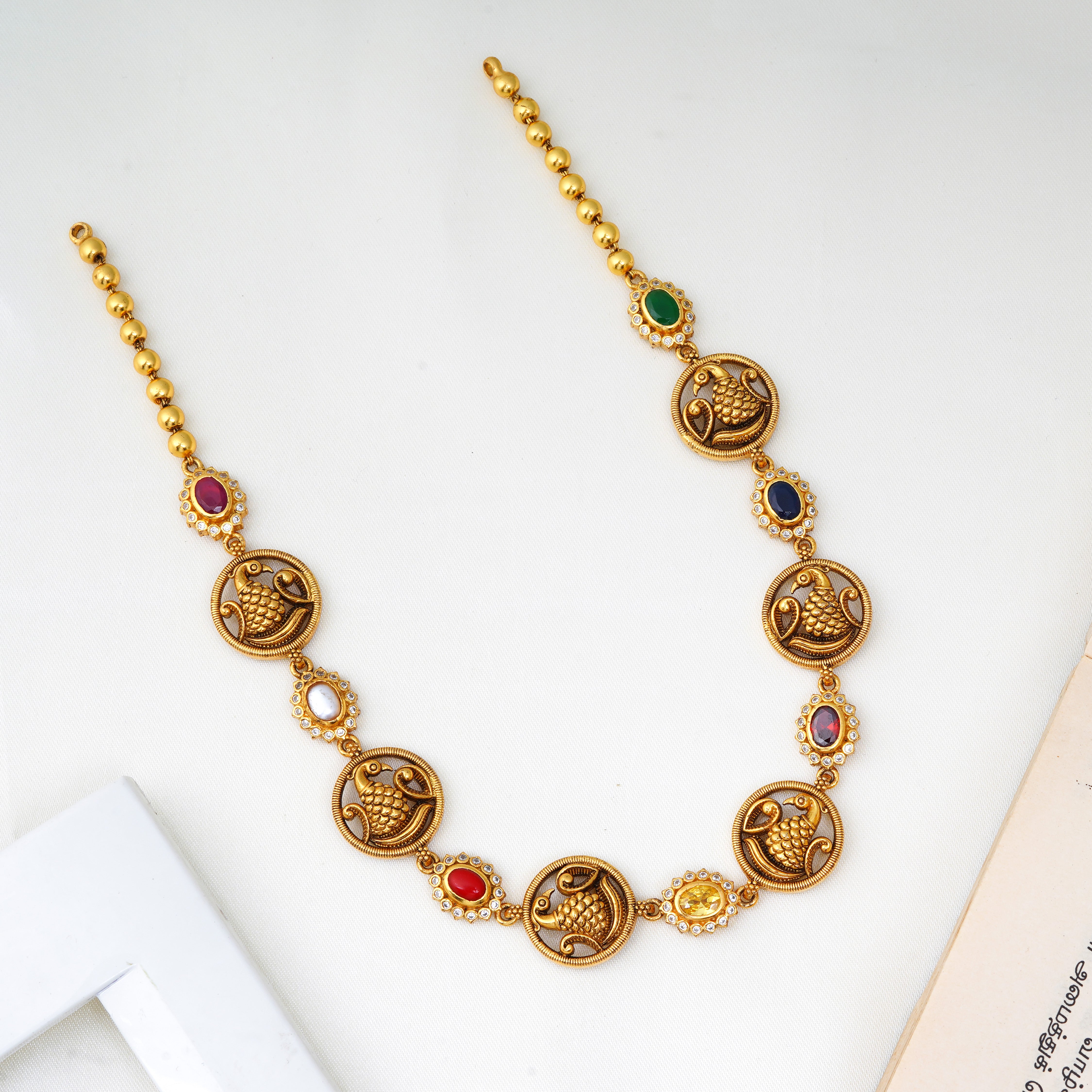 Navarathna necklace with 24K gold plated Annam motifs