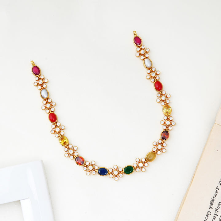 Navaratna floral necklace with 9 gemstone setting in gold-plated silver