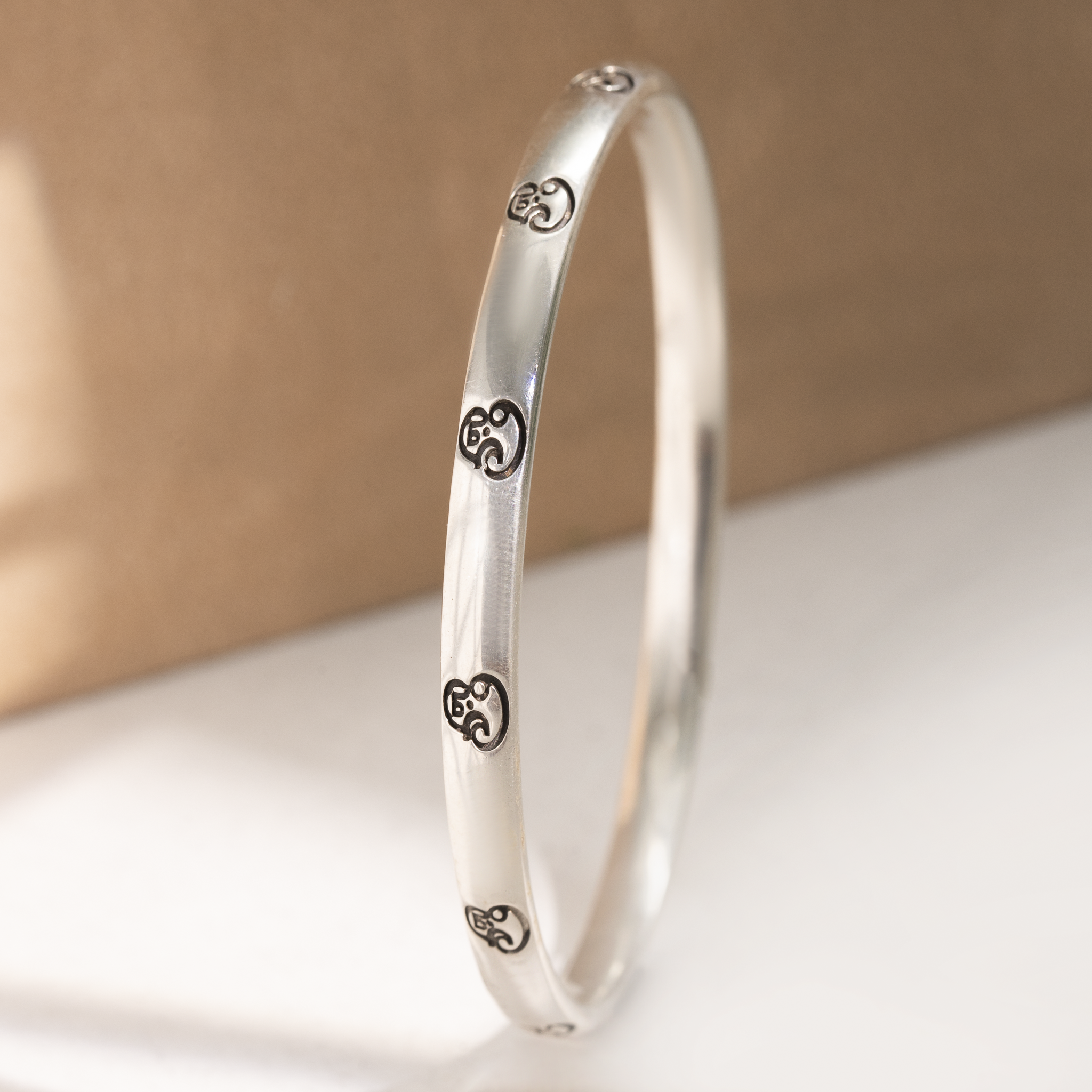 Om engraved silver kada