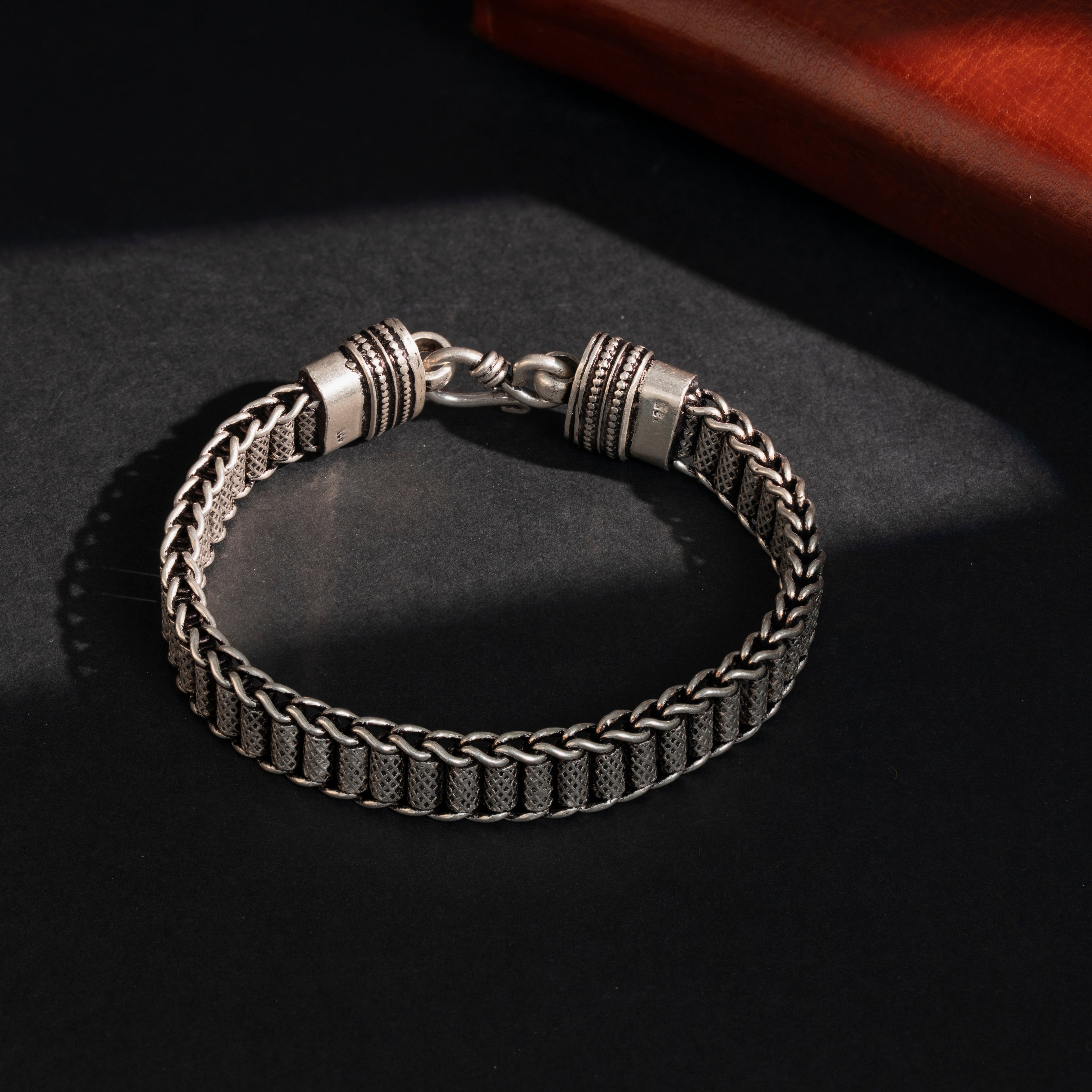 Oxidised silver bracelet with intricate texture