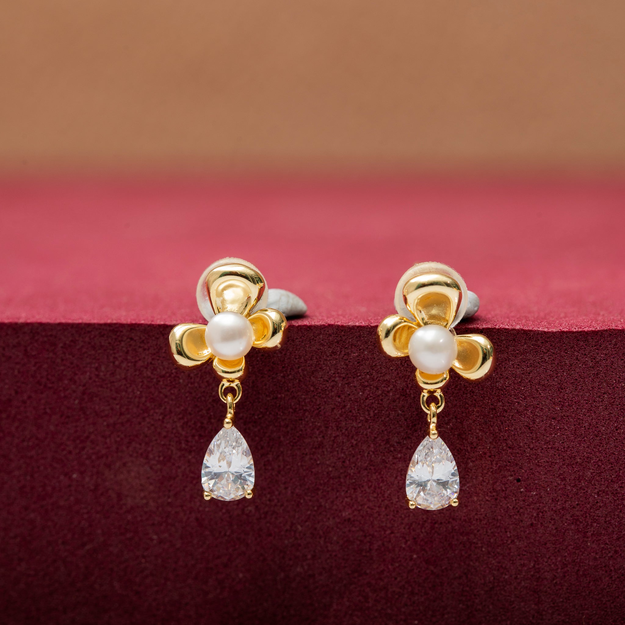 Pearl drop flower chain and stud design