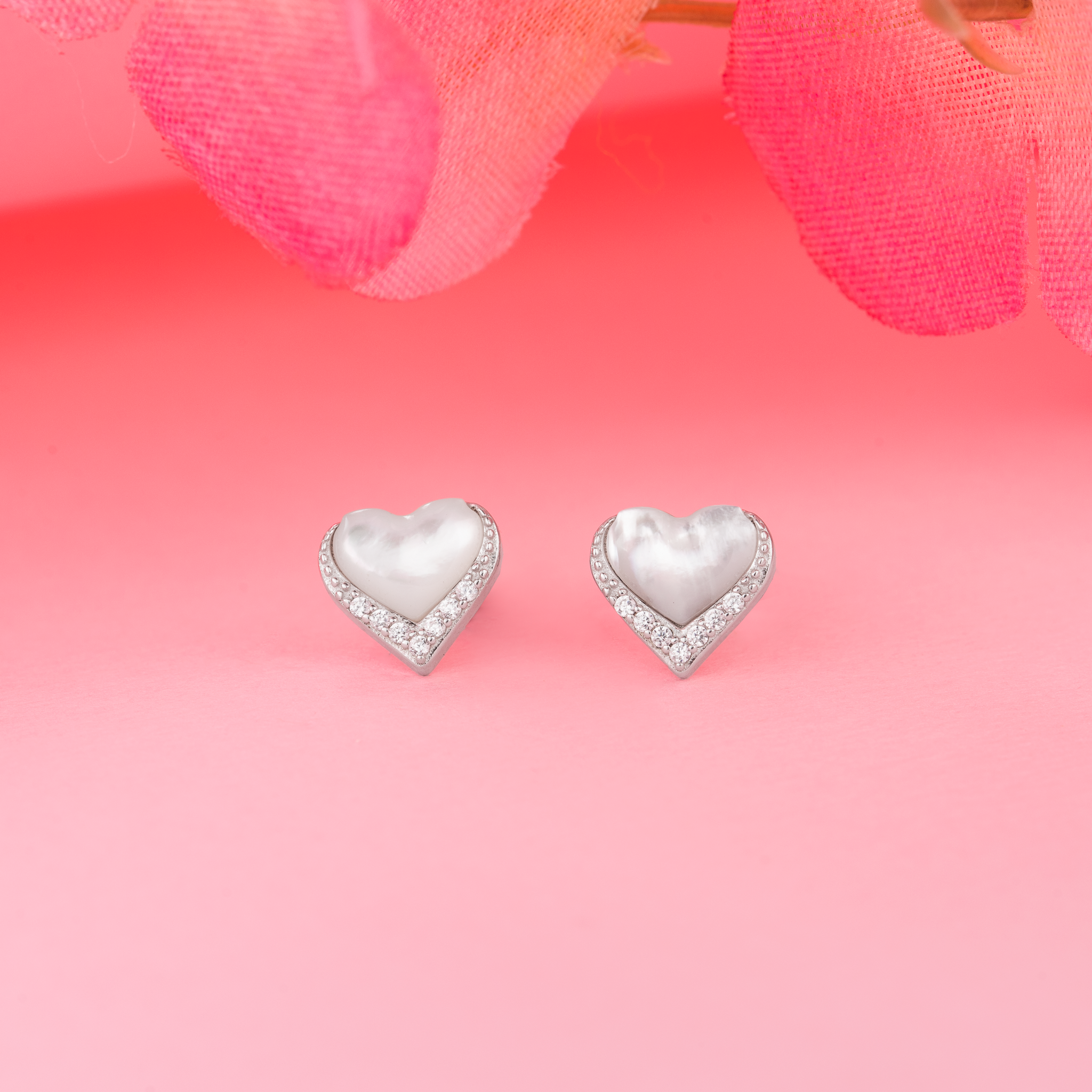 Pearl heart stud earrings