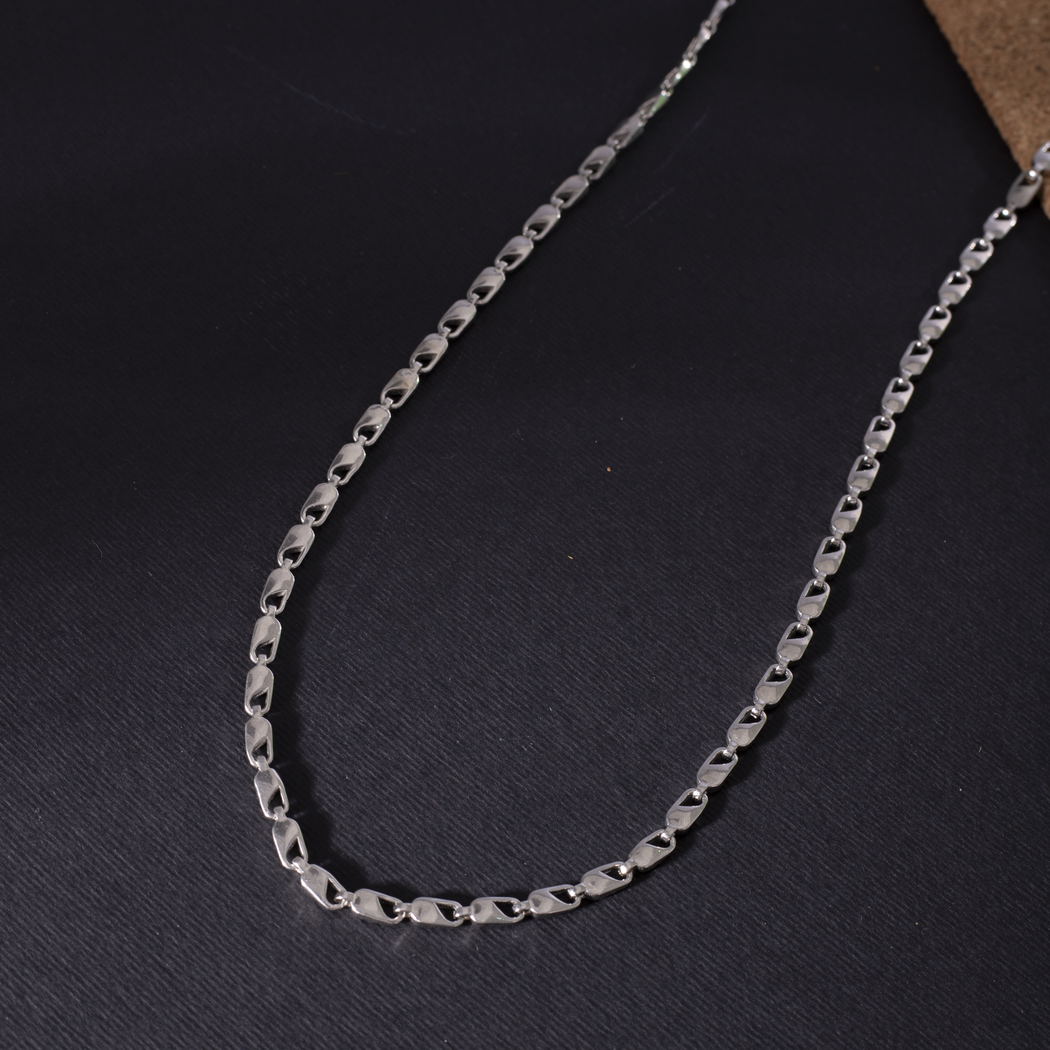 Polished flat silver chain