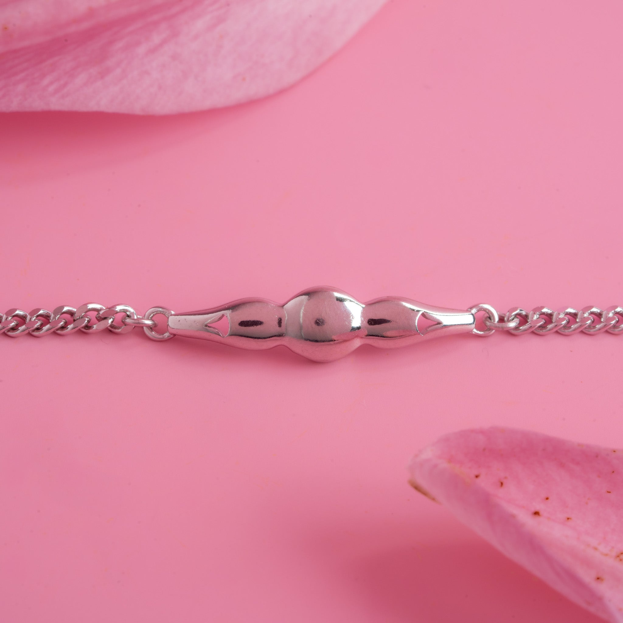 Polished silver chain bracelet clasp detail