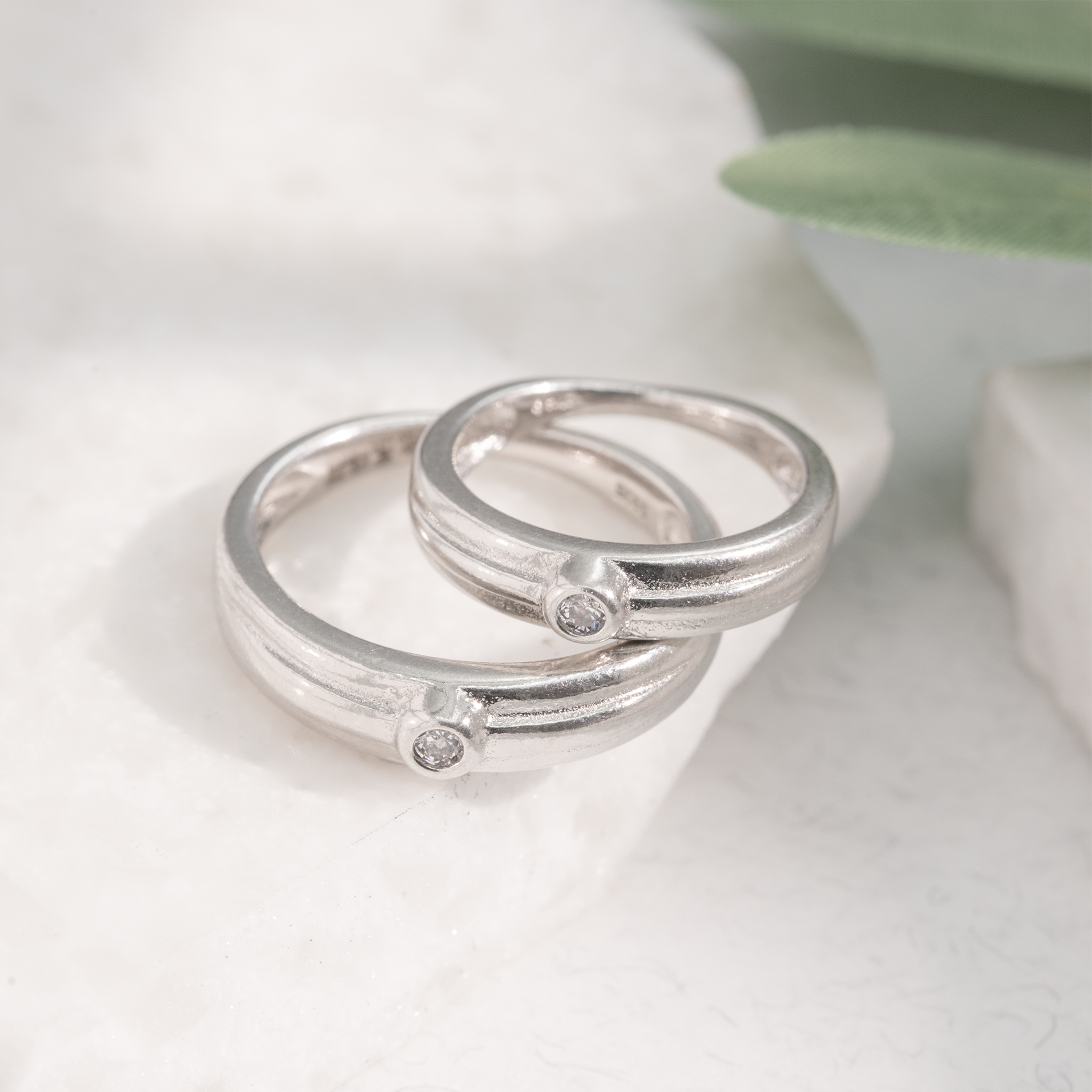 Polished silver matching couple rings