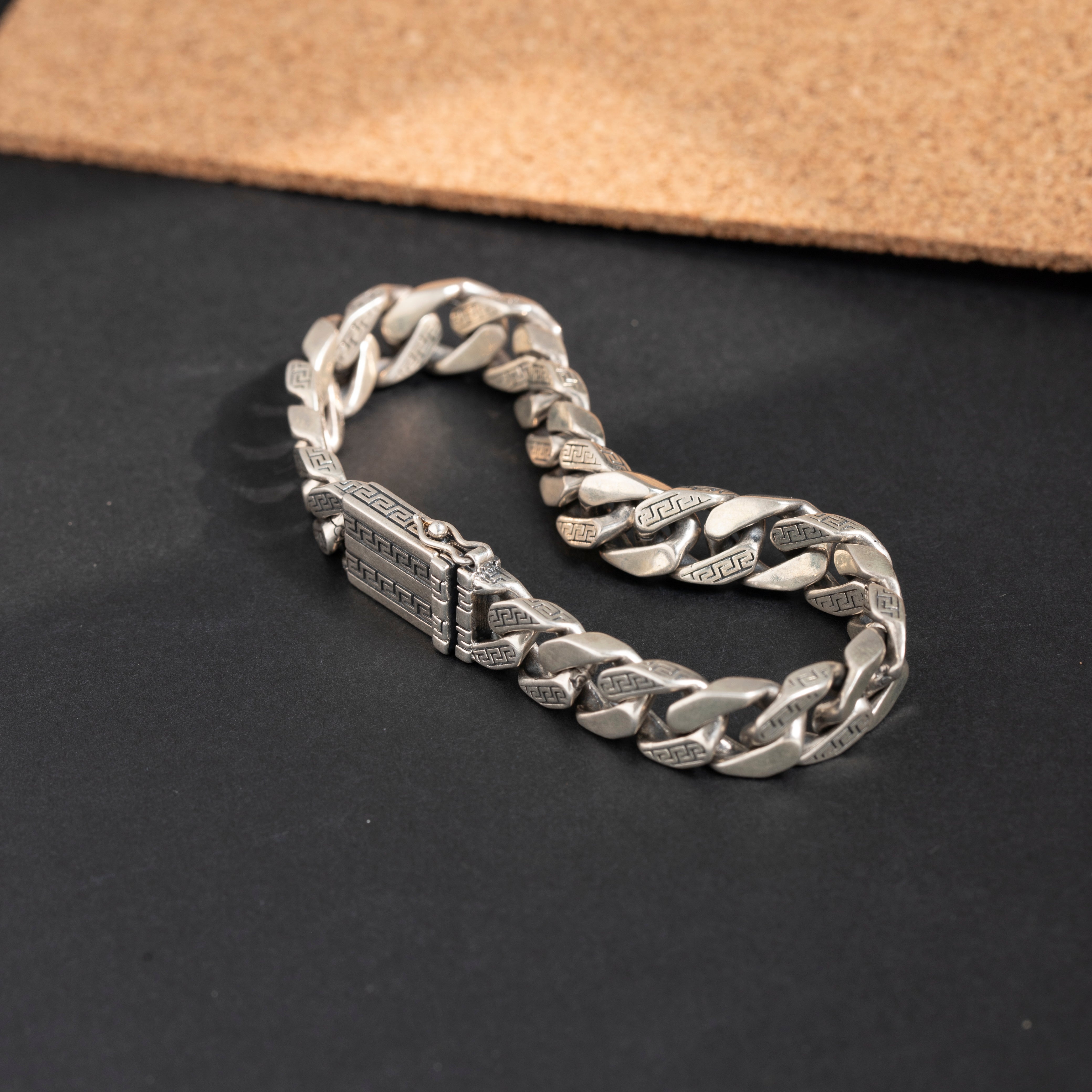 Polished sterling silver curb link bracelet