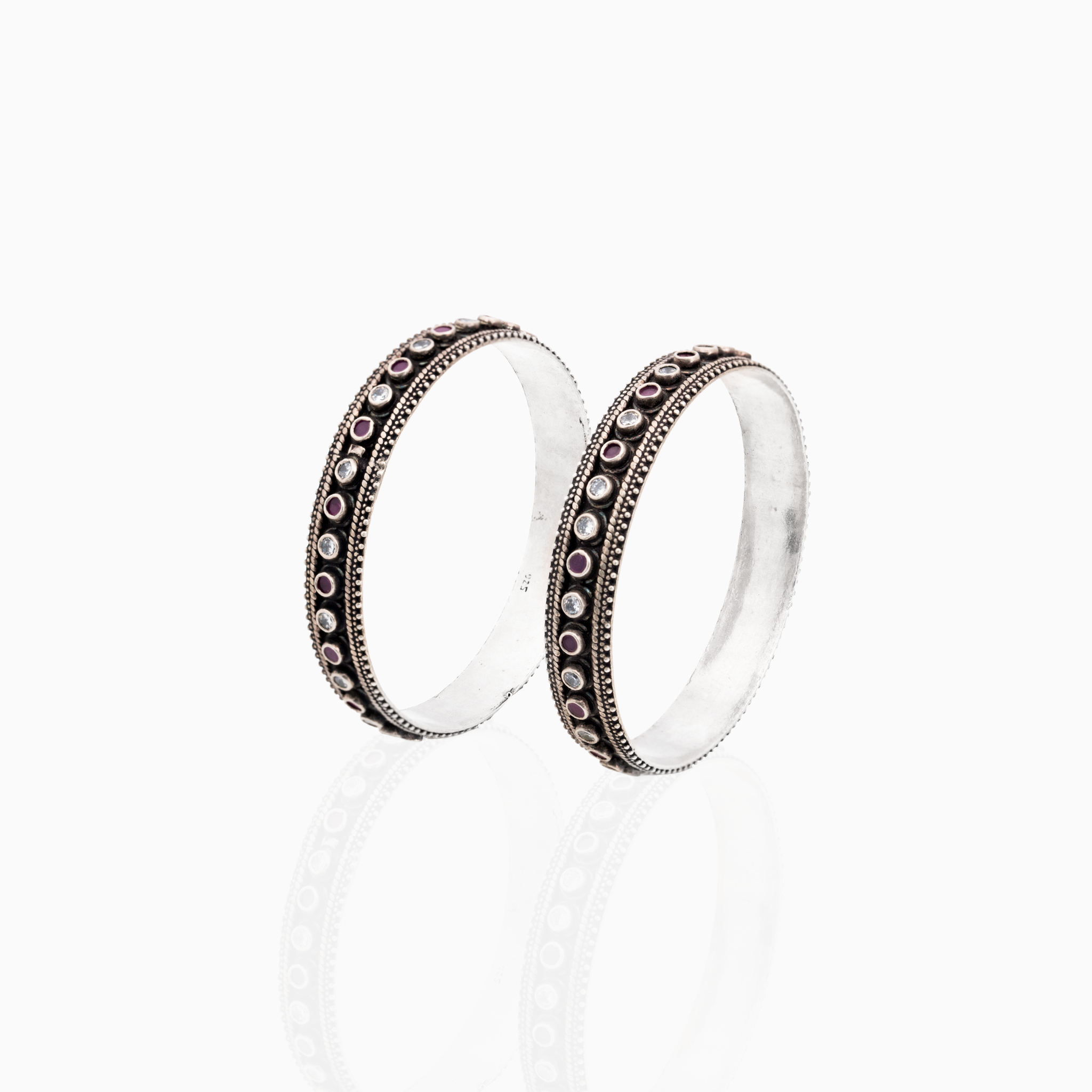 Red and white stones silver bangle