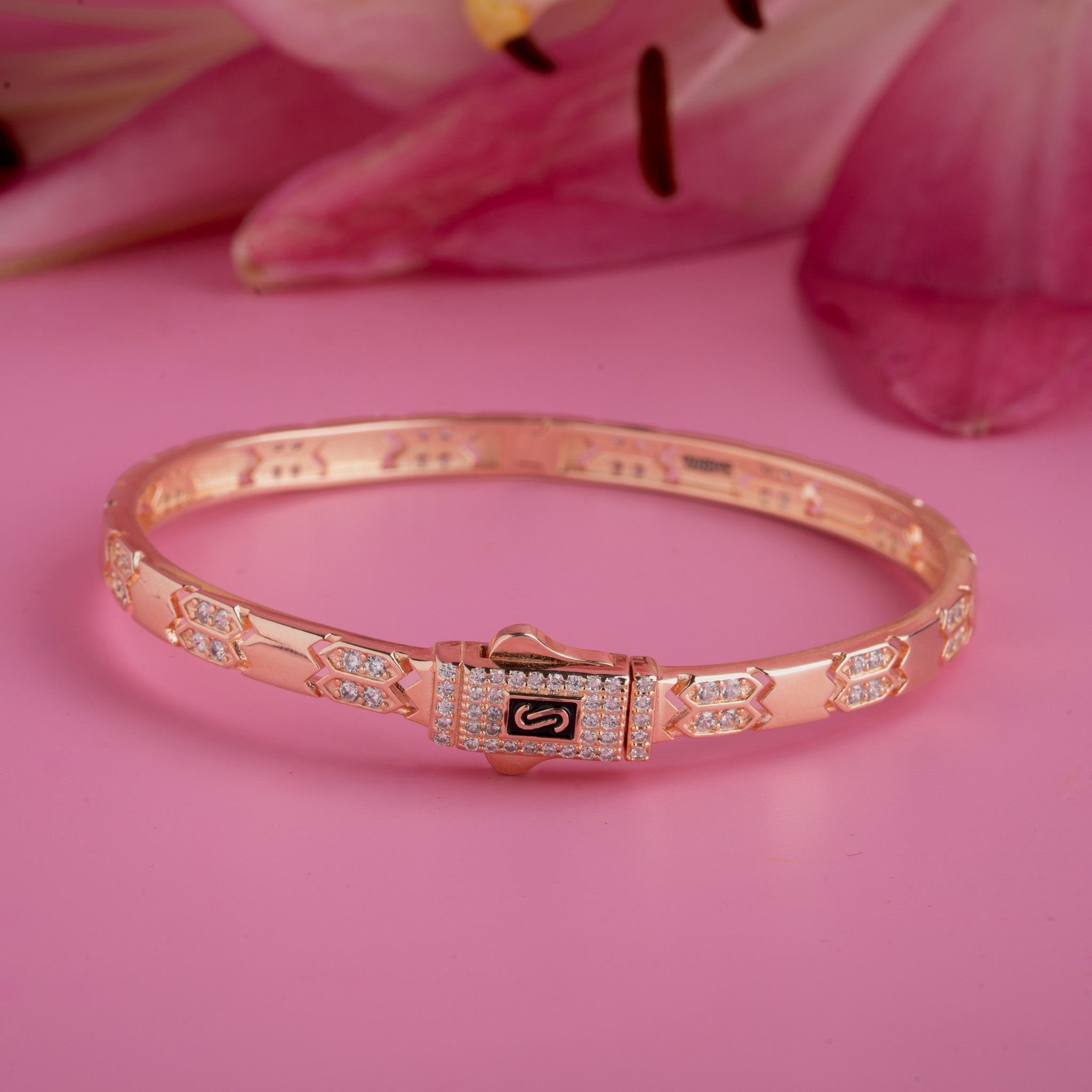 Rose gold Kada with geometric arrow motifs