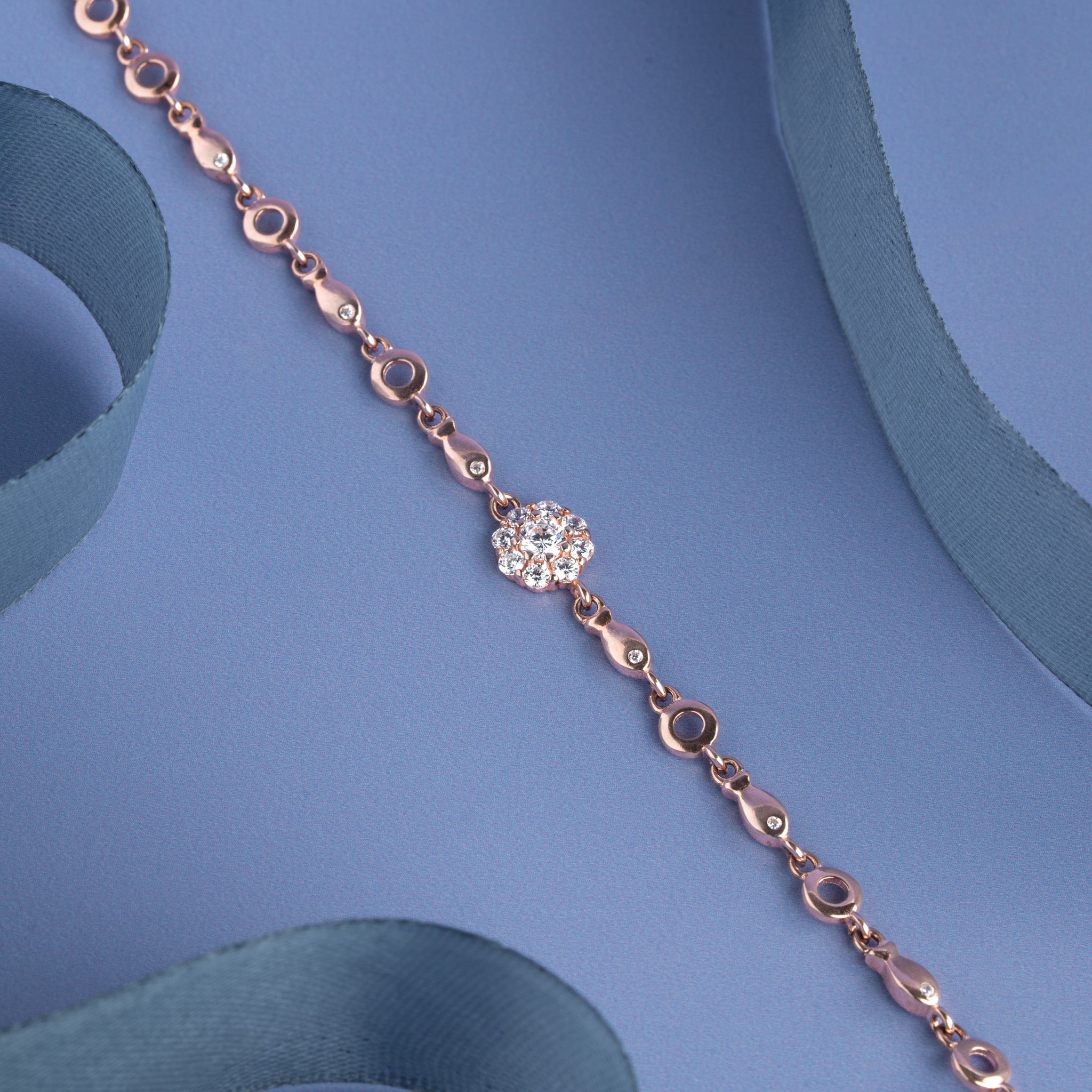 Rose gold bracelet with crystal floral centrepiece