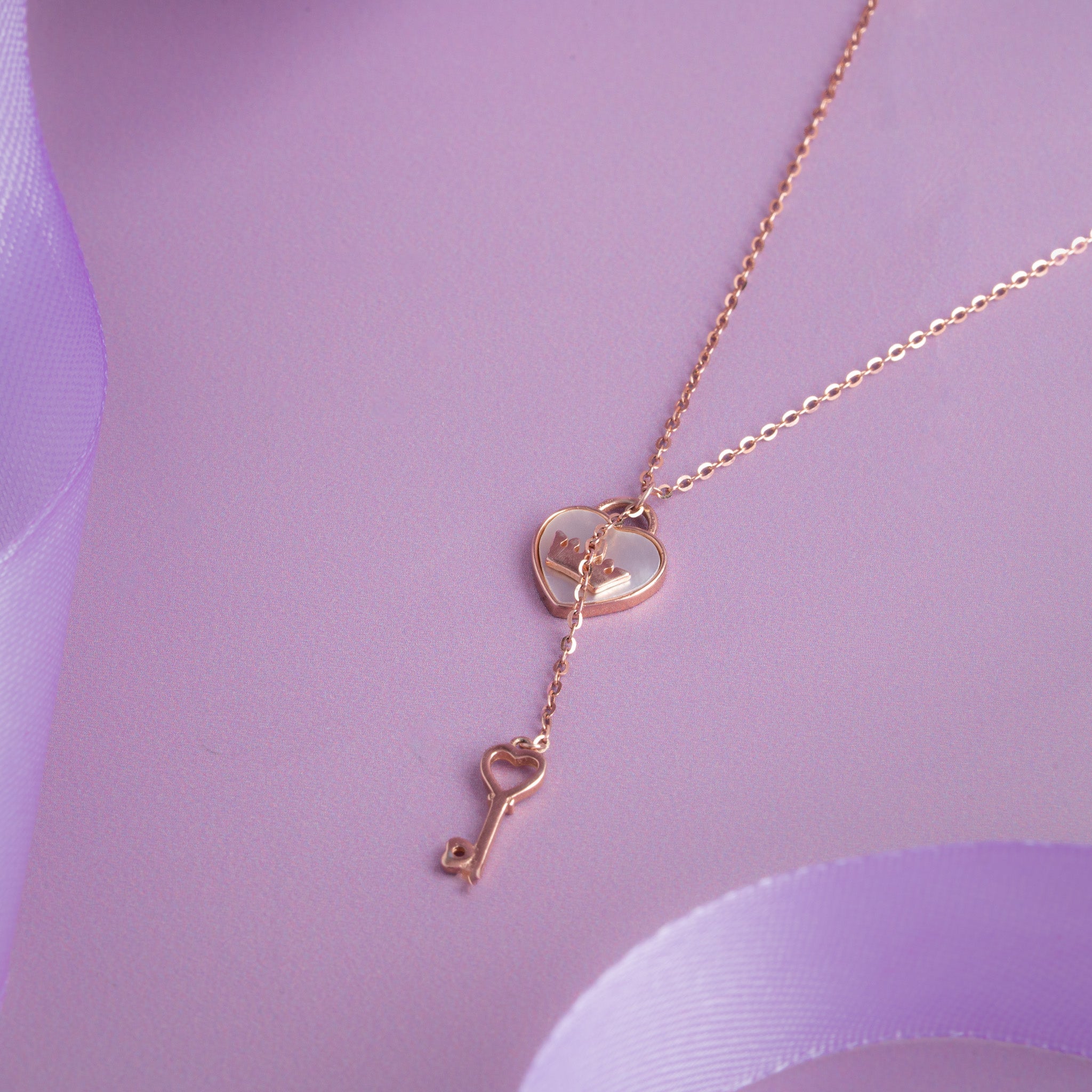 Rose gold heart and key pendant chain