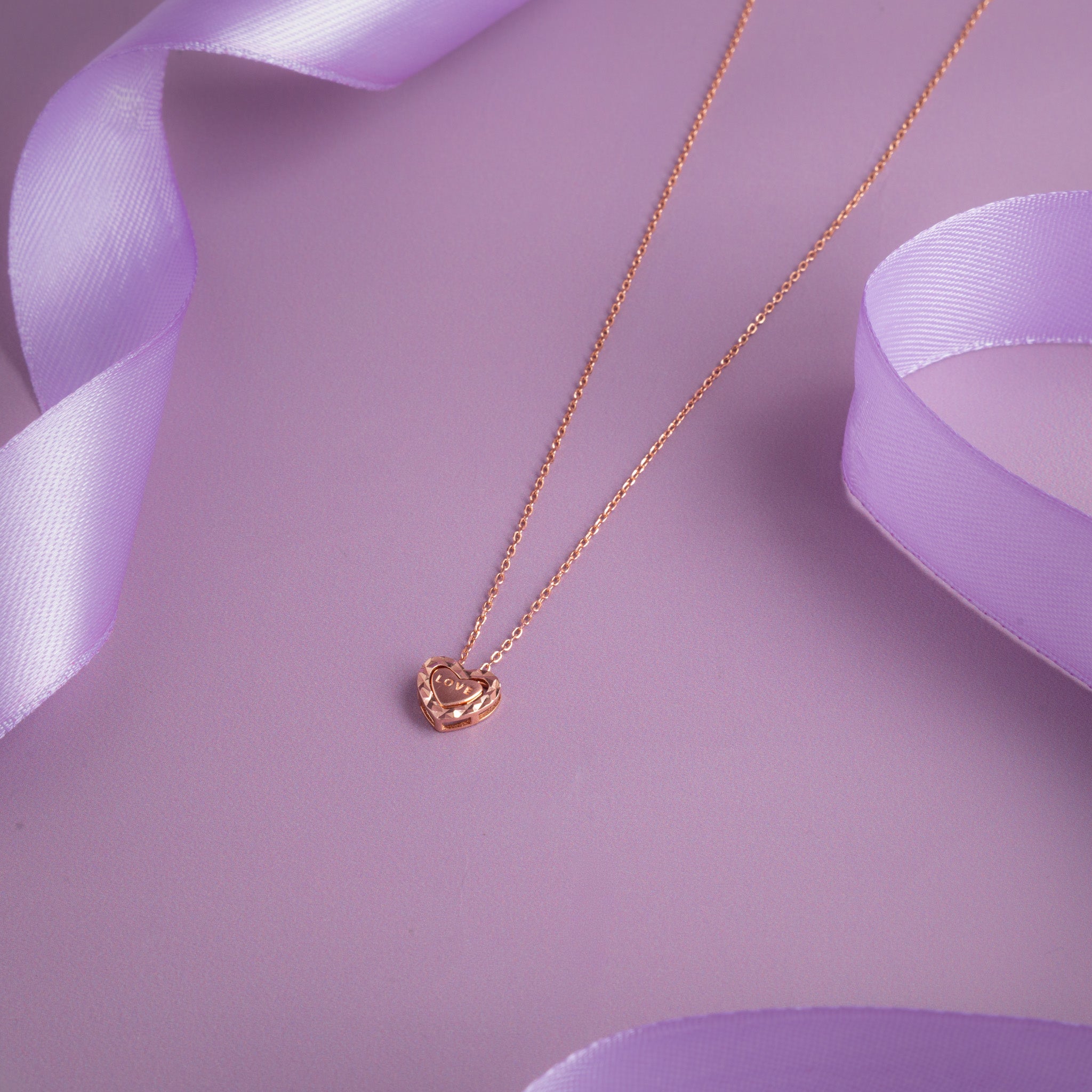 Rose gold heart pendant chain