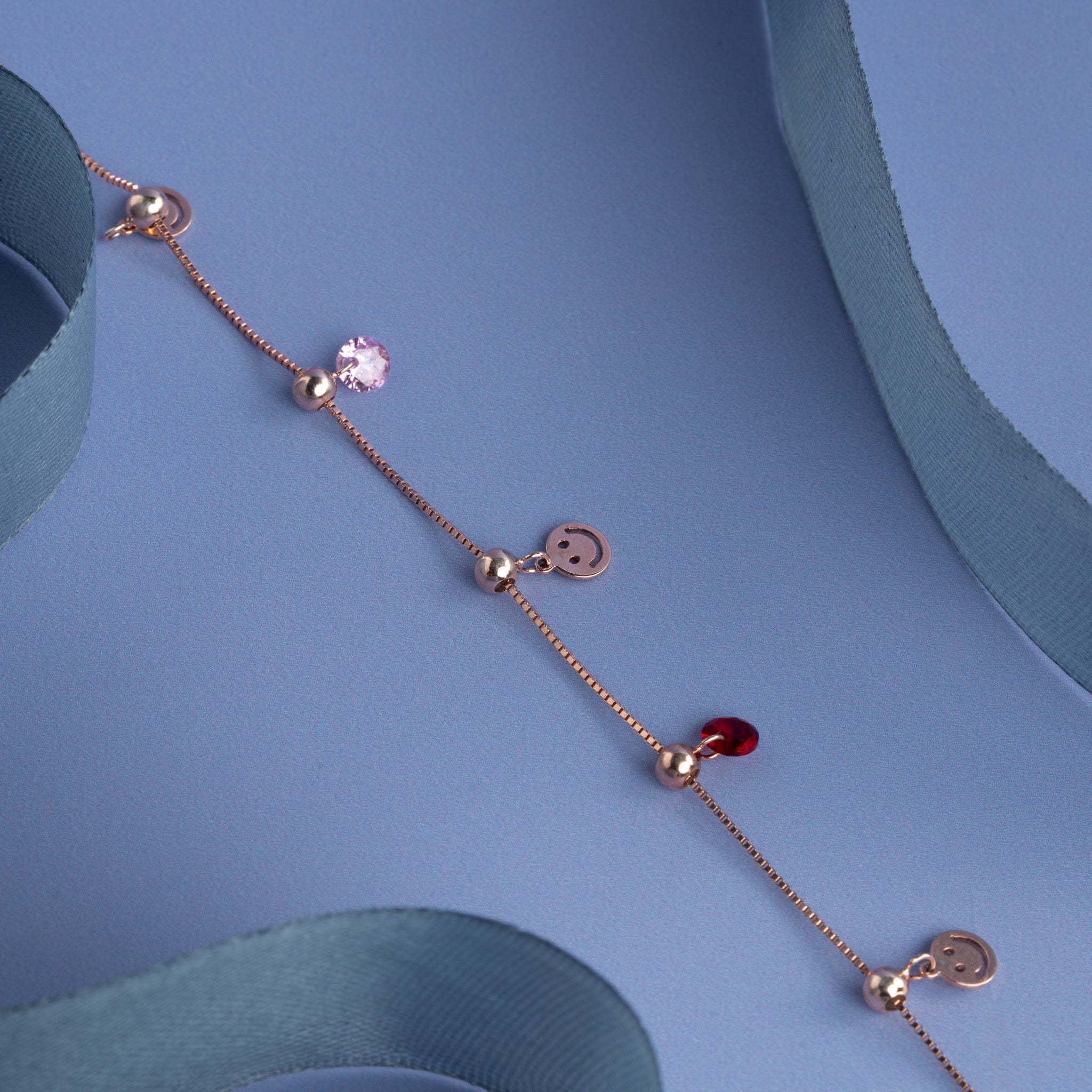 Rose gold smiley charm bracelet