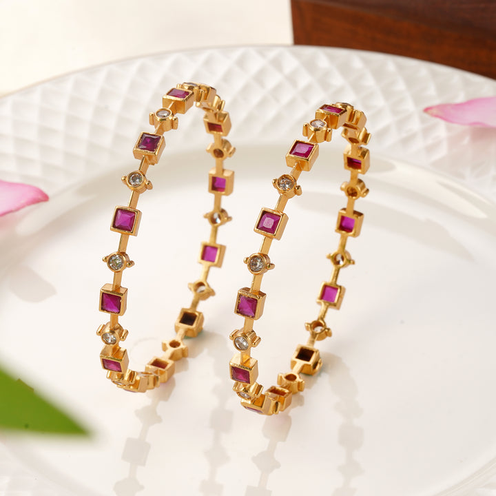 Ruby and Swarovski stone gold finish bangle design for women