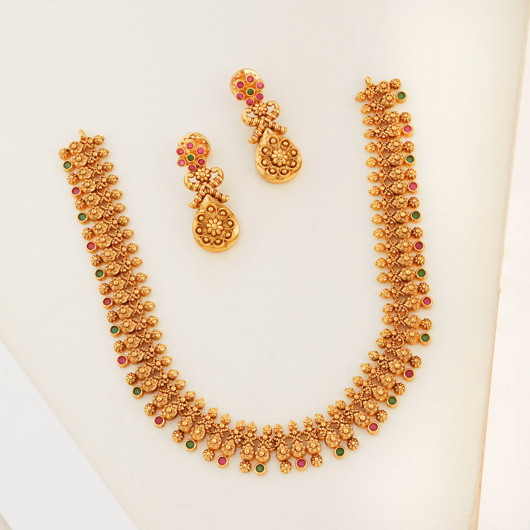 Ruby and emerald floral gold plated necklace with stud earrings