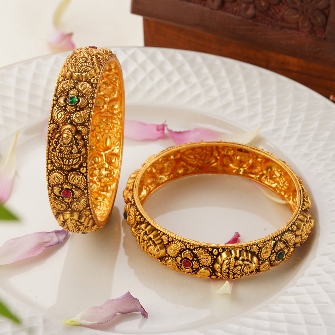 Ruby emerald stone-studded Lakshmi mango pattern gold bangles for women