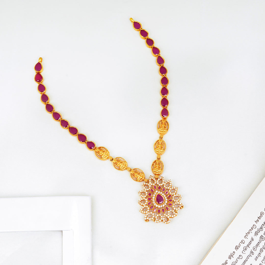 Ruby stone Lakshmi necklace with gold plating and Swarovski crystals