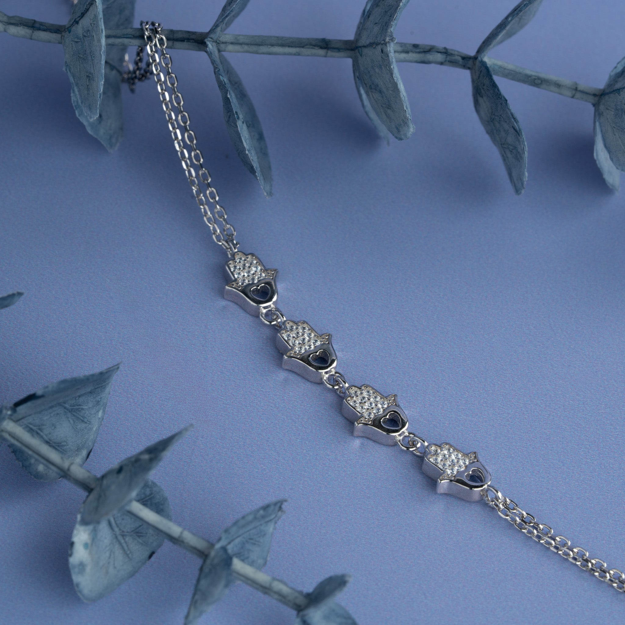 heart charm bracelet with sparkling stones