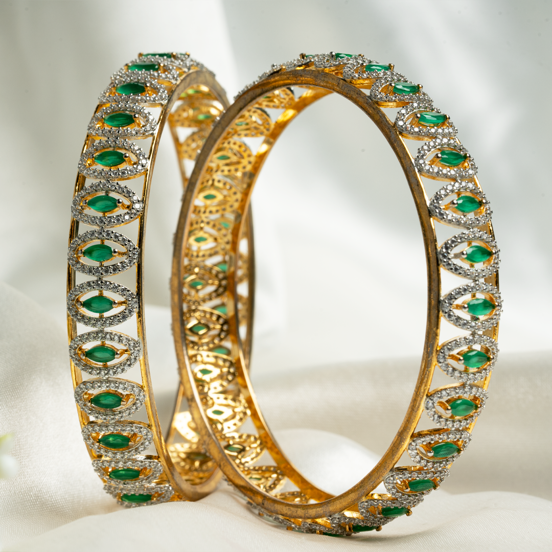 SWAROVSKI BANGLE WITH EMERALD STONES