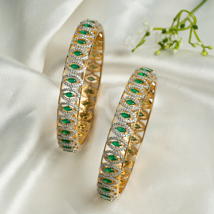 SWAROVSKI BANGLE WITH EMERALD STONES