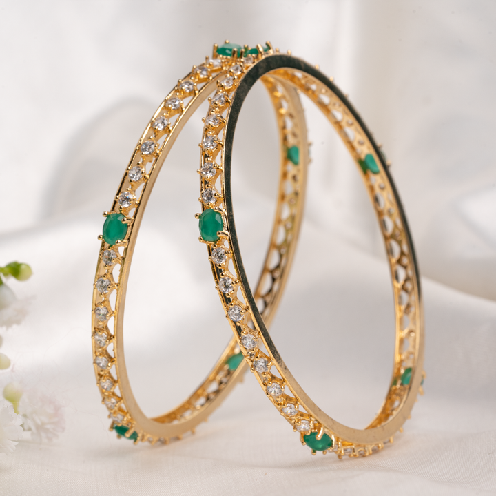 SWAROVSKI BANGLE WITH EMERALD STONE
