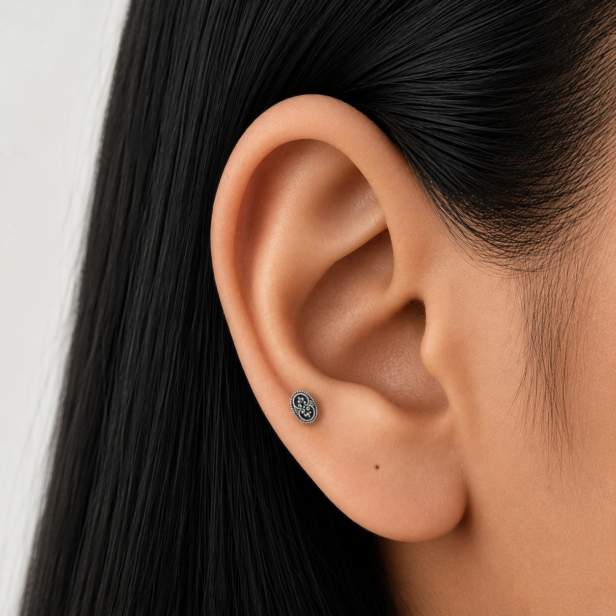 Silver Floral Oval Side Stud Earrings Ishna