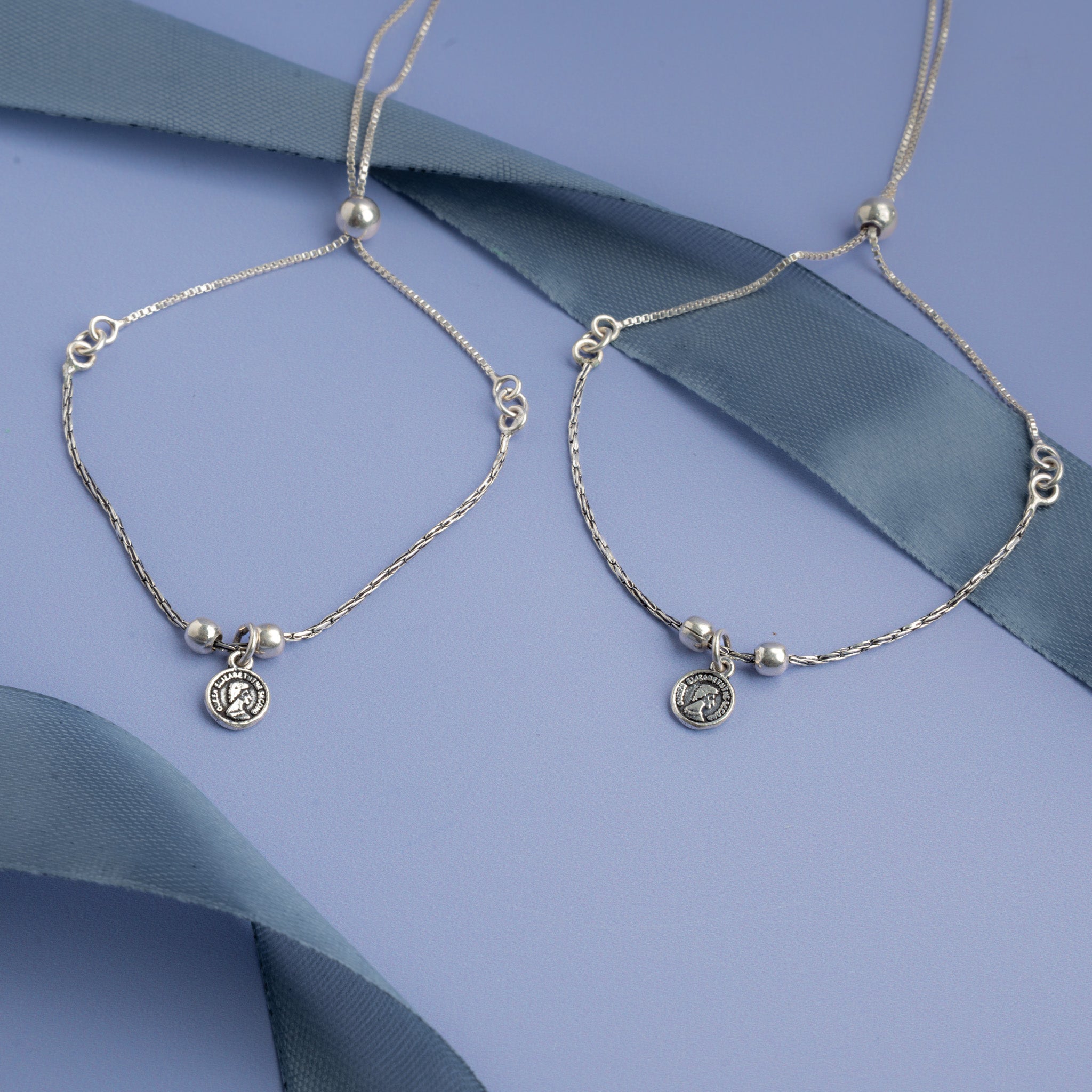 Silver adjustable anklet with coin charm