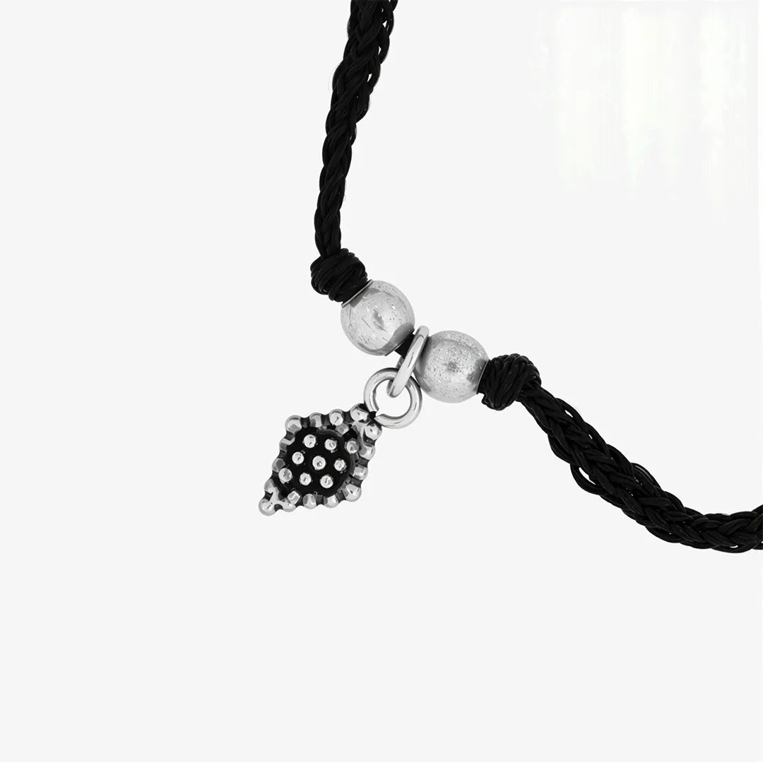 Silver and black thread bracelet