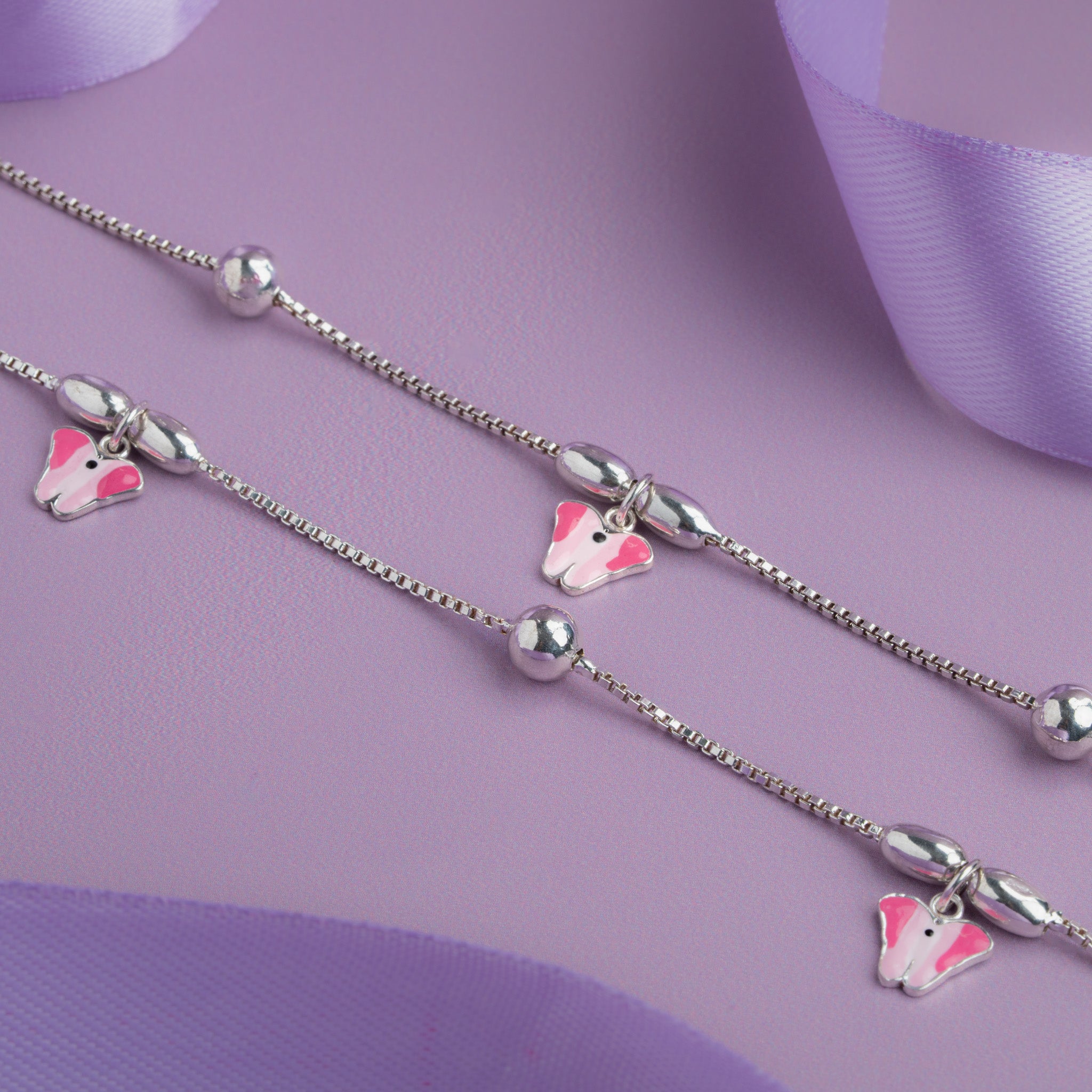 Silver anklet with pink enamel butterfly charms and bead chain