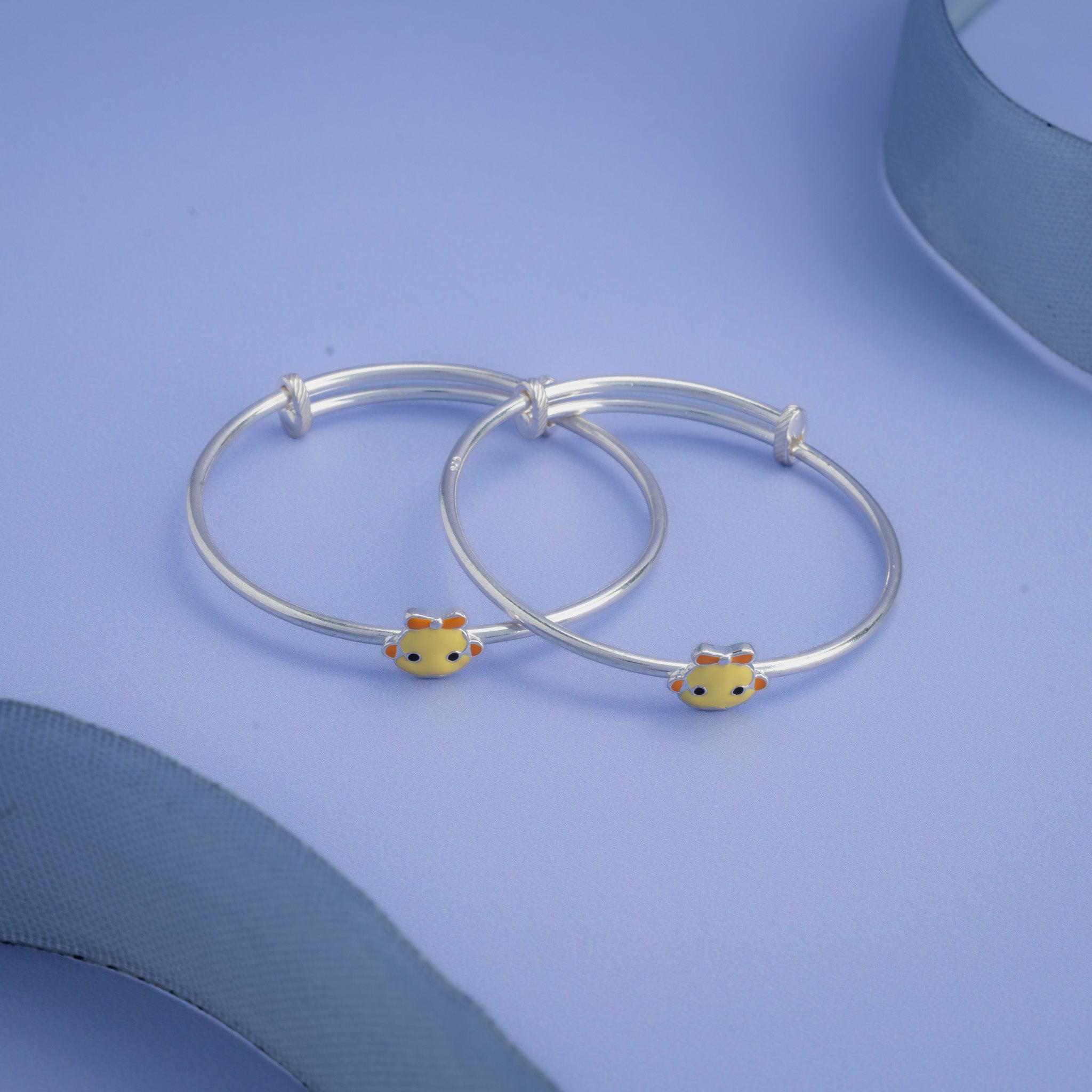 Silver baby bangle with yellow chick design
