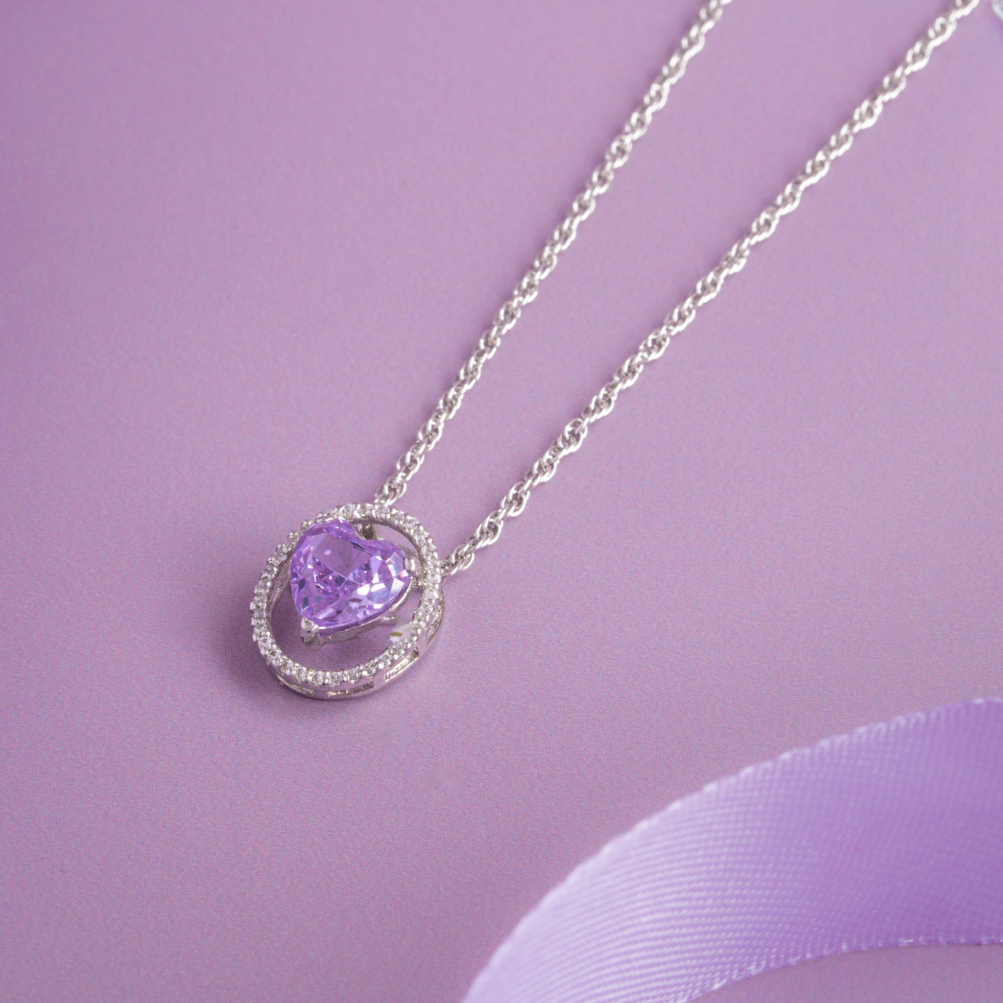 Silver chain with purple heart pendant 