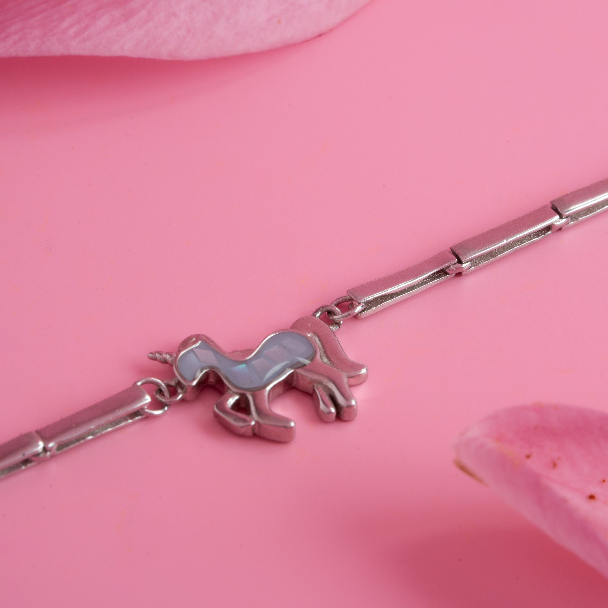 Silver charm bracelet with animal design