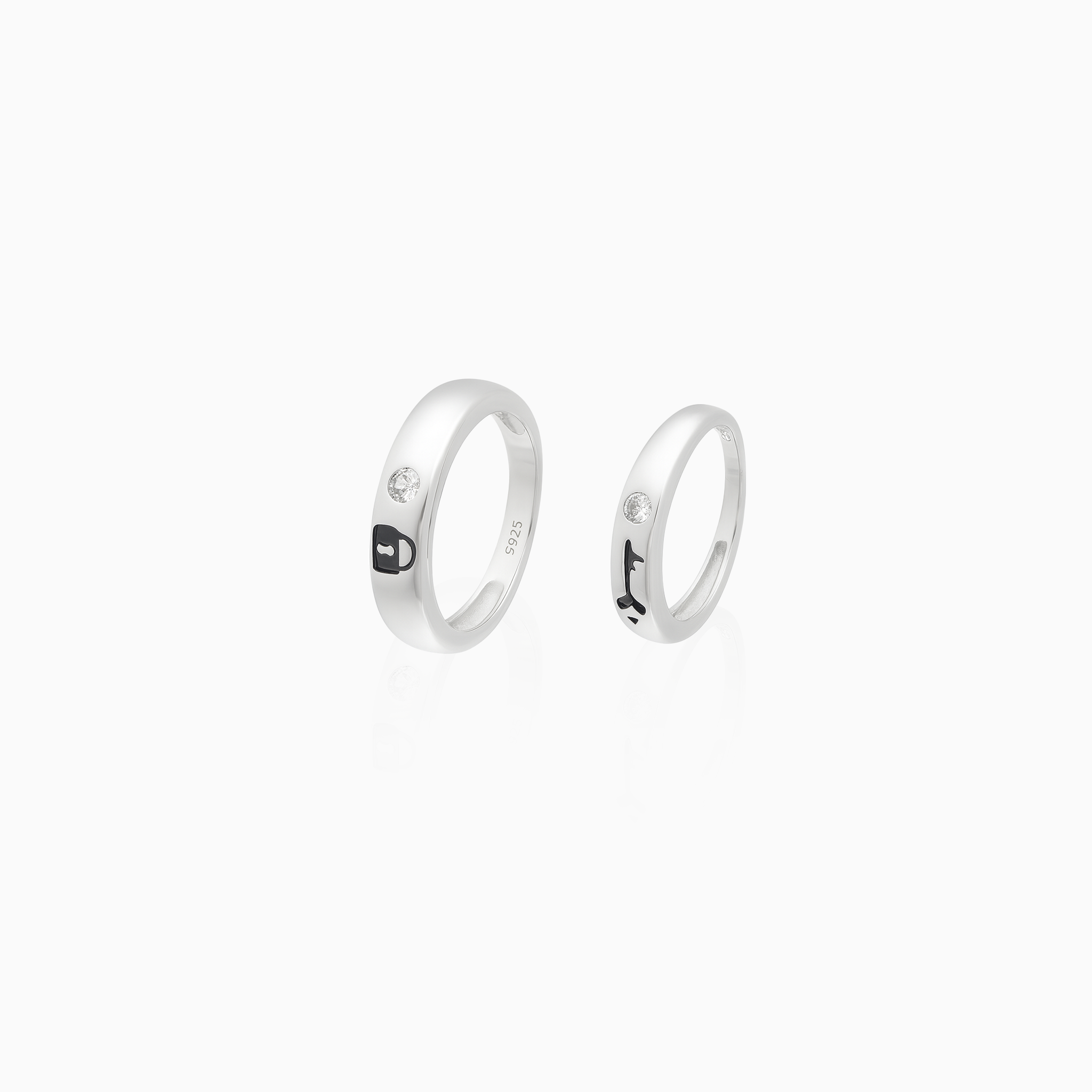 Silver couple rings with black enamel design